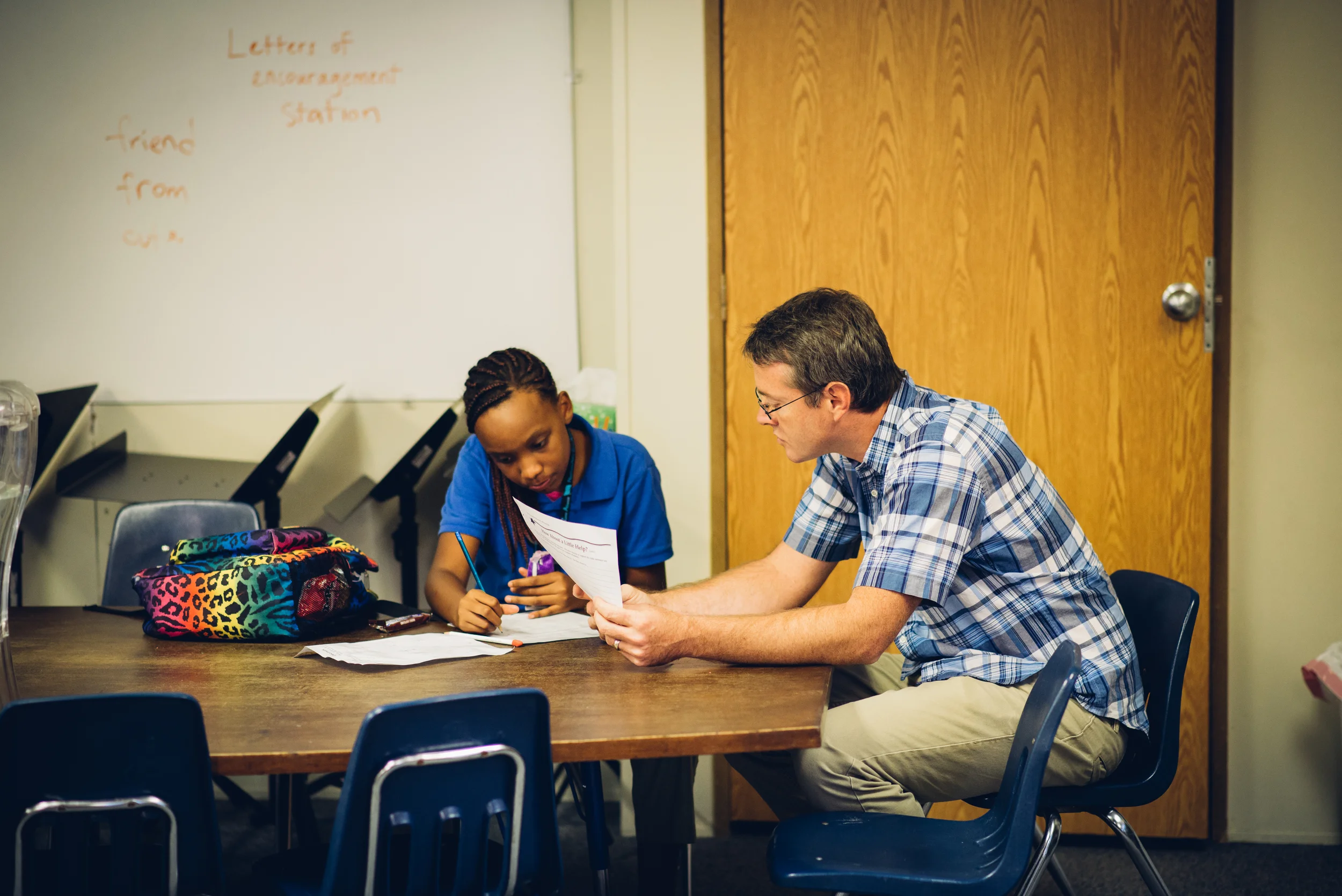 Shaun Galford, Institute for G.O.D. Instructor, helps one of our middle school students with her math homework. Our C.A.S.E. after school program provides opportunities to kids in the Hopewell neighborhood and Old Hickory area to improve academically, while offering them enrichment activities like gardening, cooking, building, and more. Opening the Community Center will provide us with larger and better suited space for this program. 
