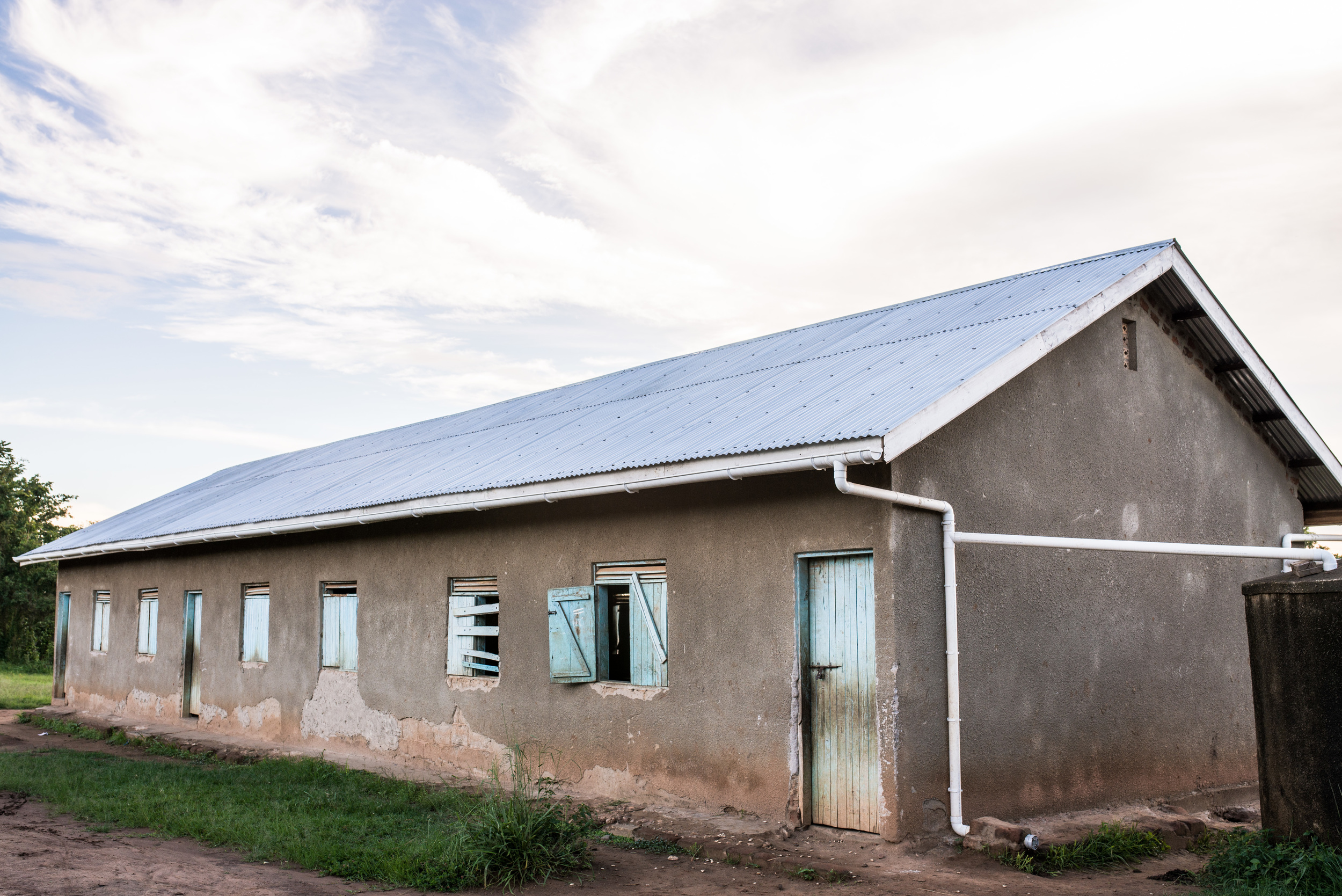A new roof was added to the building. Parents and neighbors contributed labor, materials, and food for the workers--the development of St. John's is becoming a community project. 