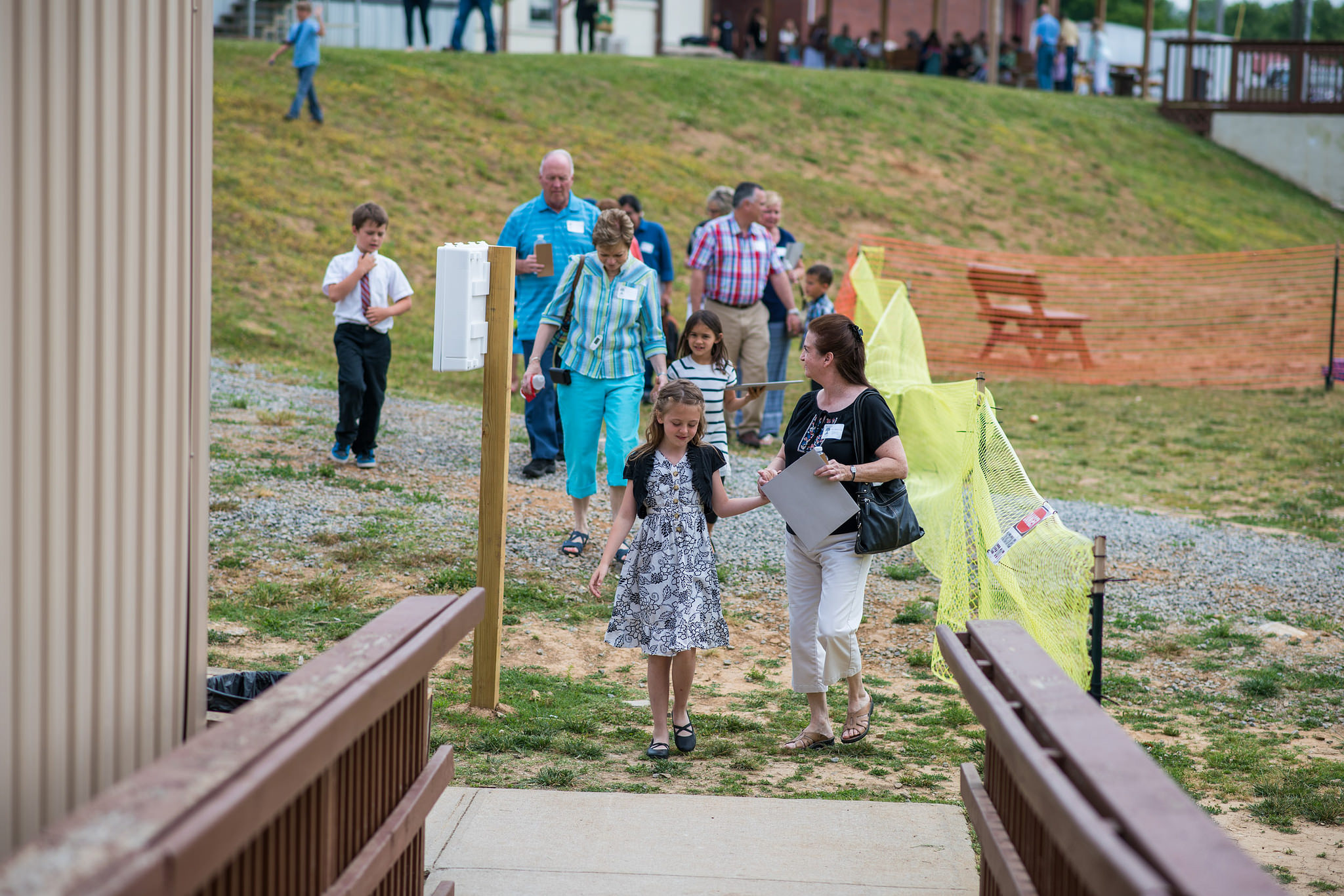 Grandparents sat in on classes with their student. Here, Esther Bargatze leads her grandmother to her classroom. 