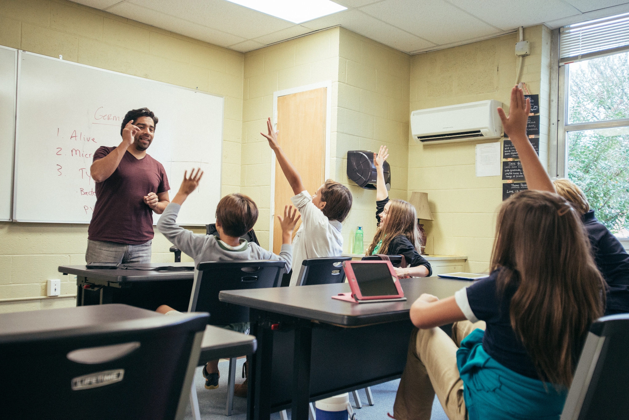 Mr. Munoz is a favorite teacher of many. Alongside being a homeroom teacher, Mr. Munoz teaches health classes, like "Germs" (pictured here). 