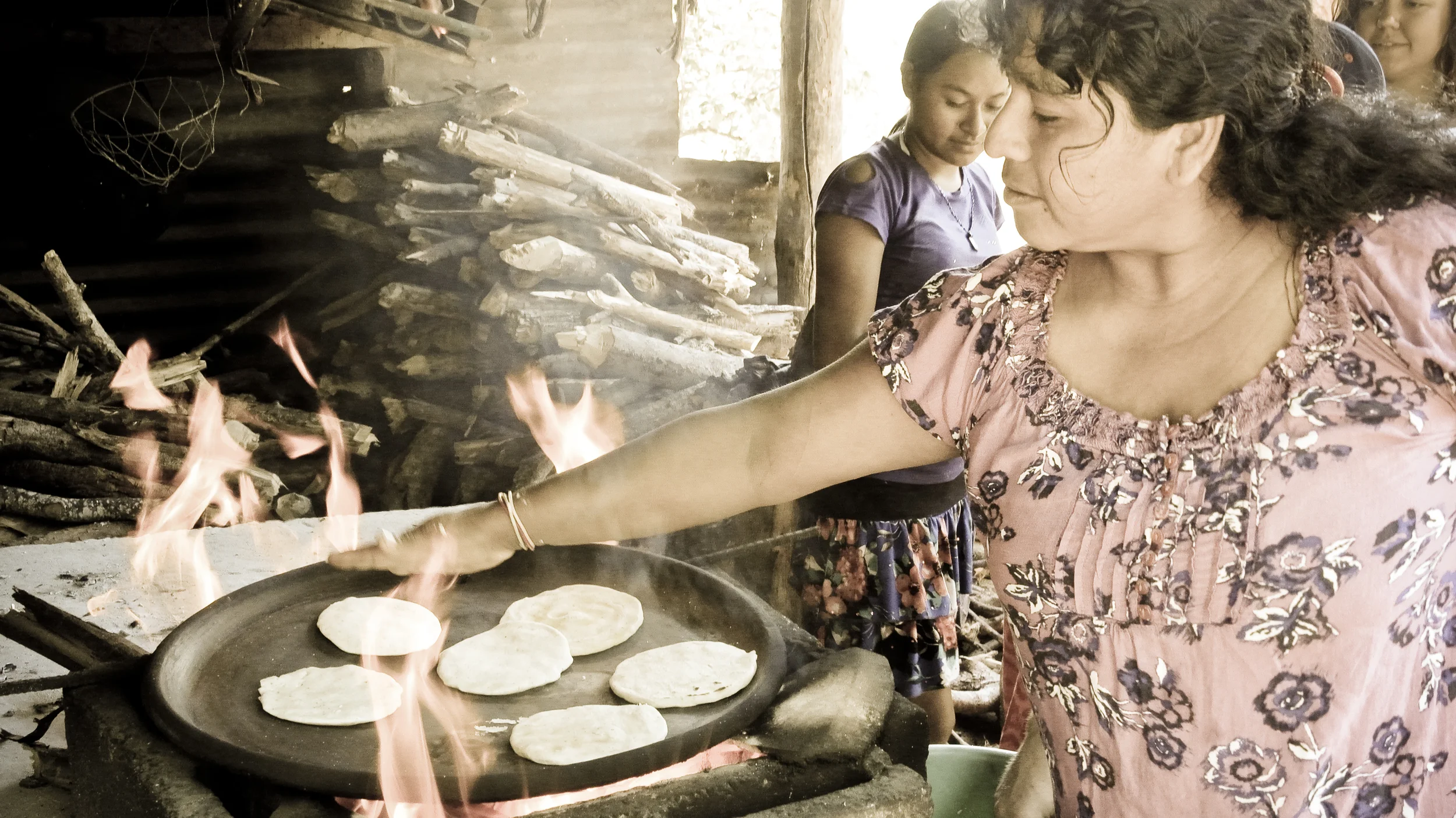 Cooking with open fires is common in El Salvador. This method requires a lot of wood, which is a resource that is physically demanding to gather.