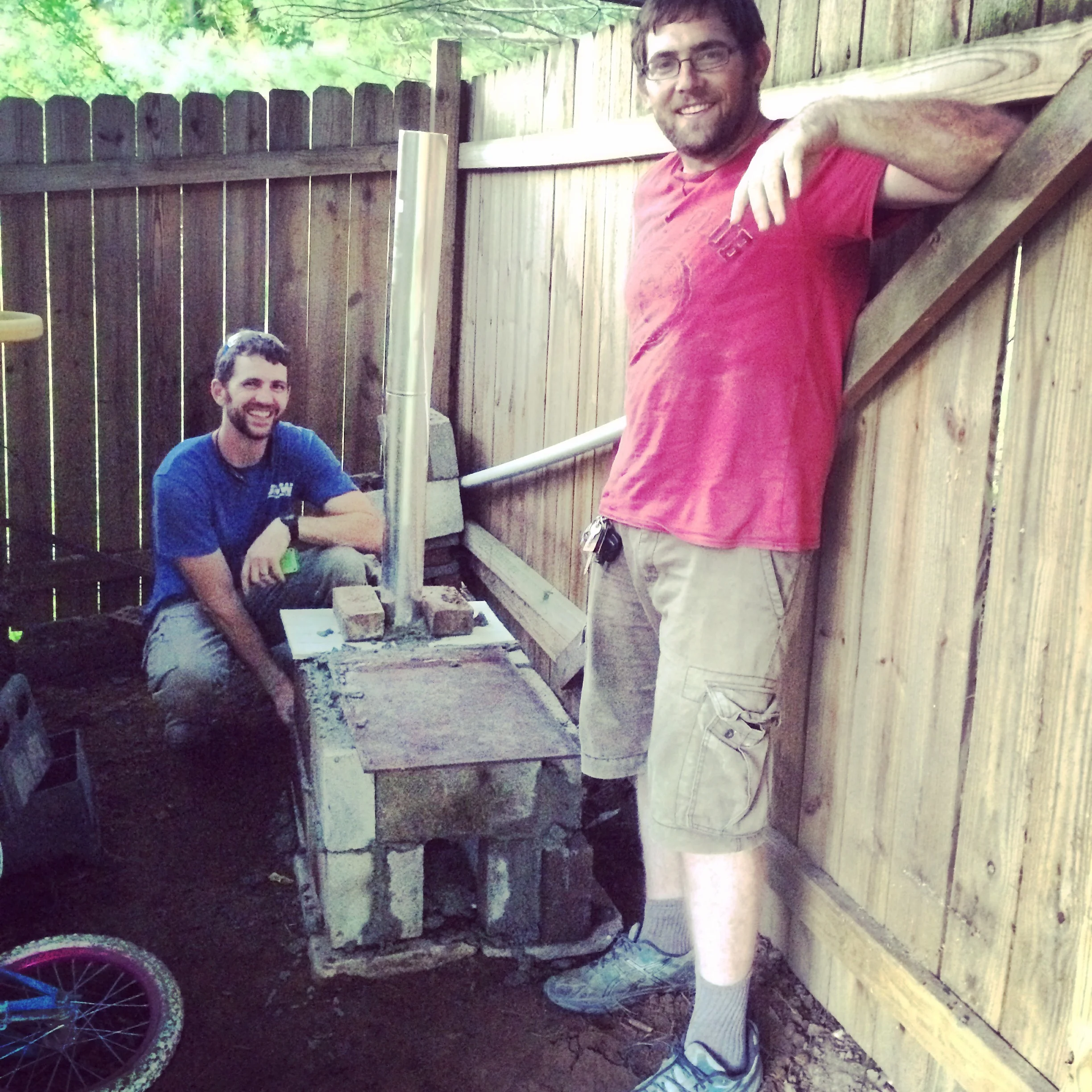 Michael Johnson and Jeremiah Watson constructed a rough prototype rocket stove in Tennessee. 