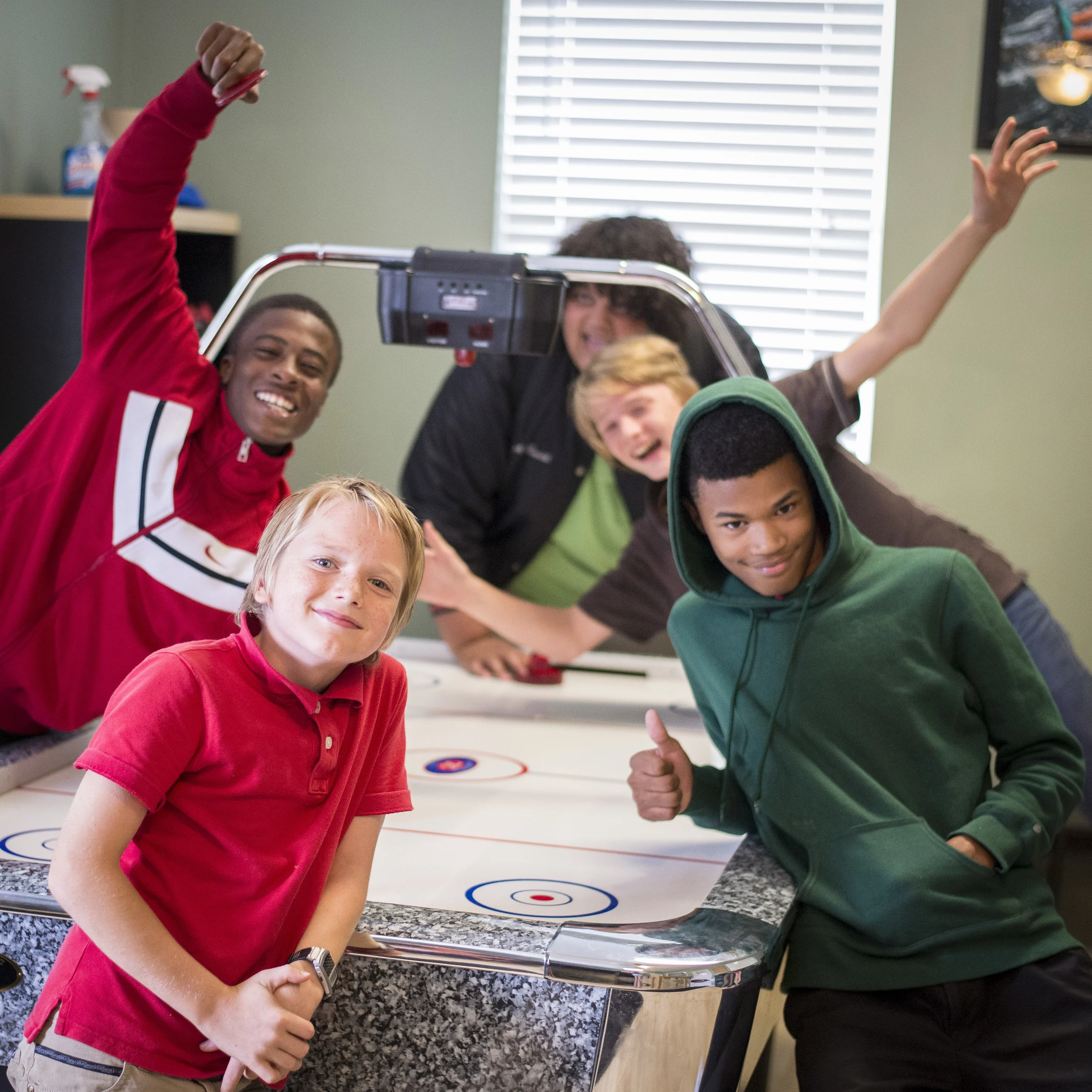 We recently added an air hockey and ping-pong table and arcade basketball to our community center (in process), which the kids love. Read more about the Hopewell Community Center and how you can help. 