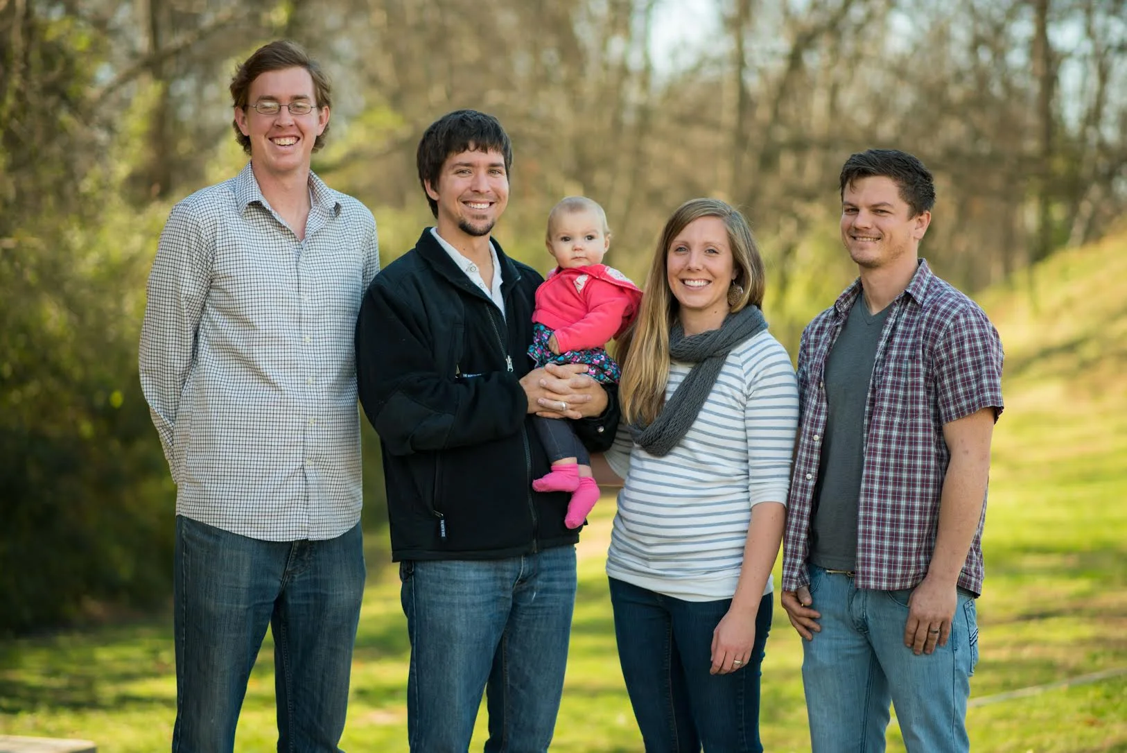 Left to Right: Brett Madron (Director of G.O.D. South East Asia), and SEA team members Ty (baby Elsie) and Meg Mathews, and Jason Carpenter.