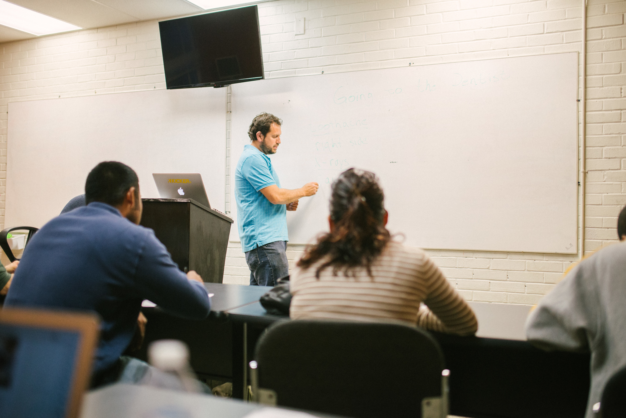 During this particular lesson, Marco helped students know what to expect out of a dentist visit: the process of filling out forms, x-rays, exams, and some of the terminology they would need to know, like cavity. 