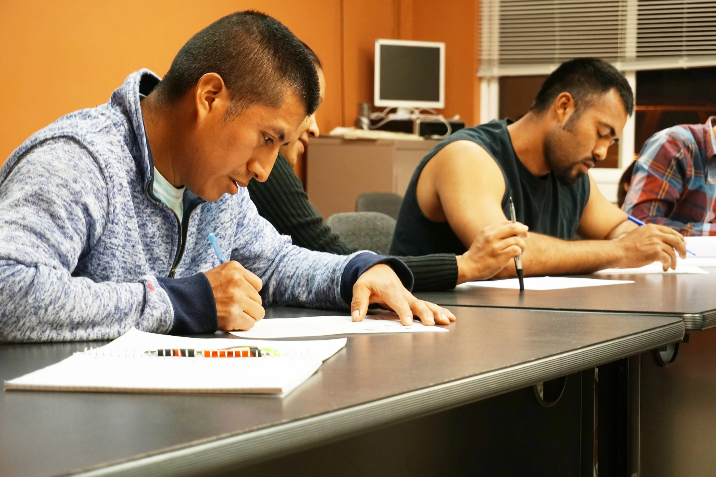 Students get an opportunity to practice both written and spoken English, helping them engage relationally on their day-to-day, and know what's expected of official paperwork. 