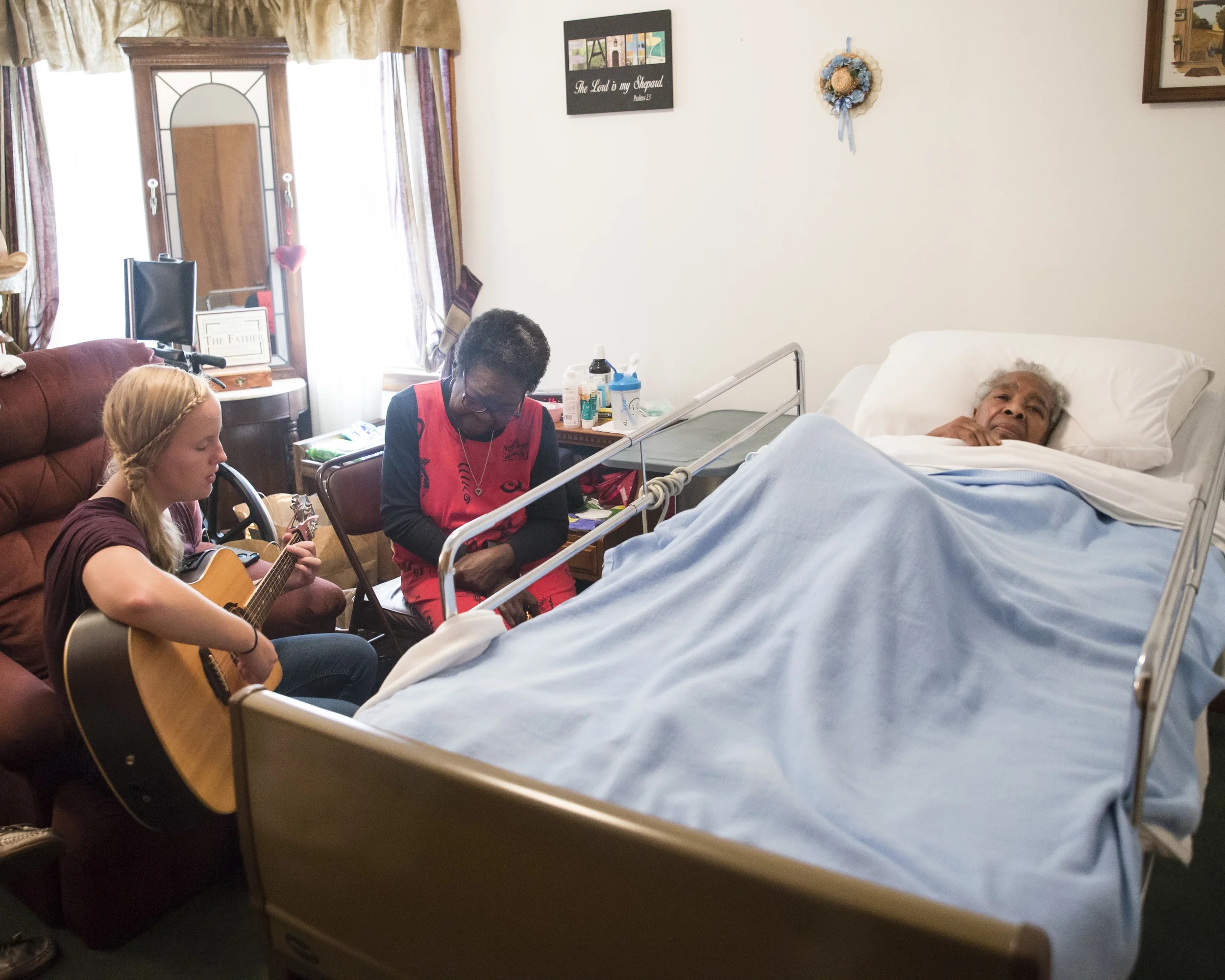 Anna Hastings, a student at the Institute for GOD, shares a song with one of our neighbors in Hopewell. Anna serves the elderly in Hopewell in a number of ways, and one of those ways is providing comfort through music.