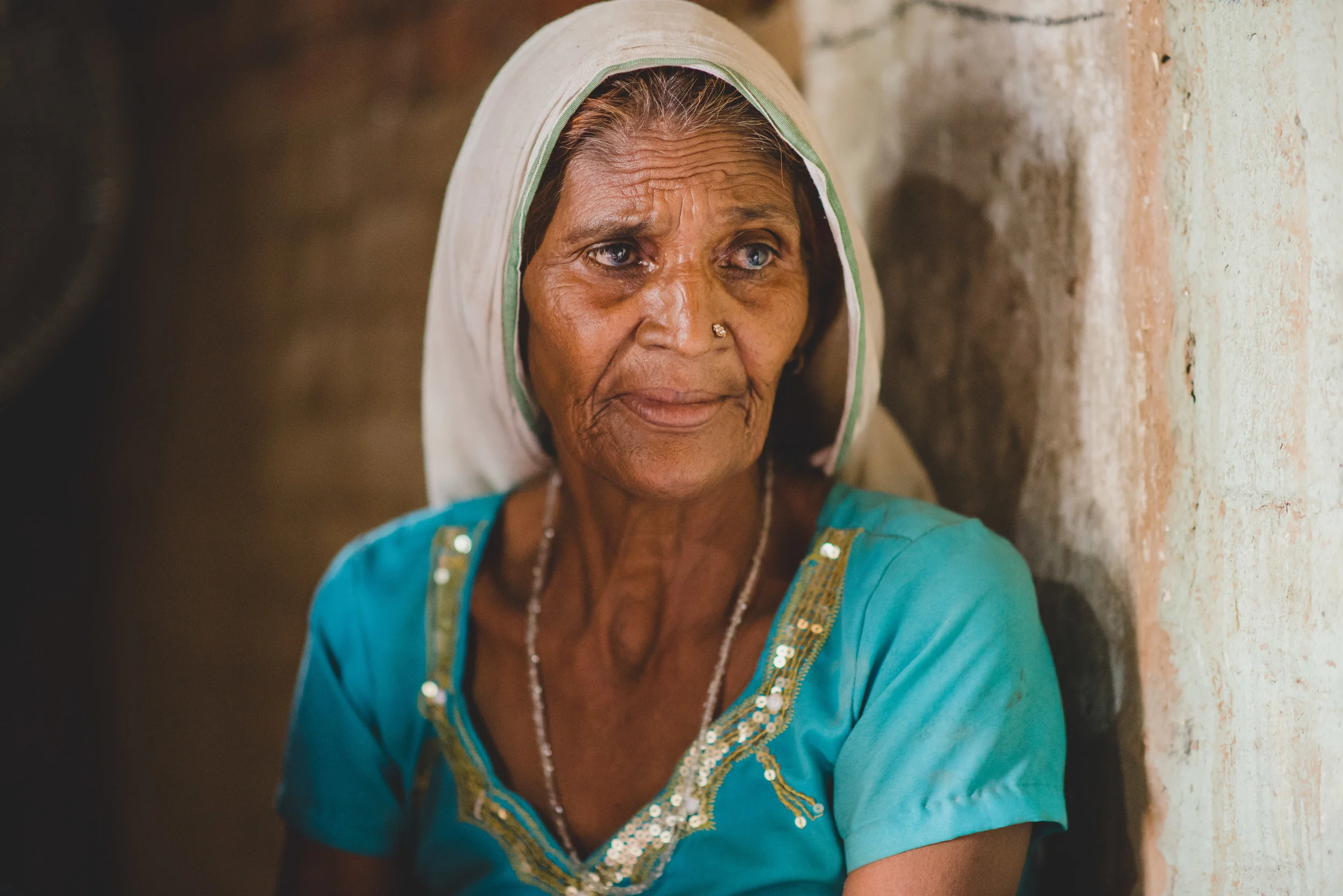 A village midwife shared a lifetime of stories with us including how she has witnessed the end of an era as ancestral farmlands are sold to make room for high-rise dwellings and business parks filled with multi-national corporations.