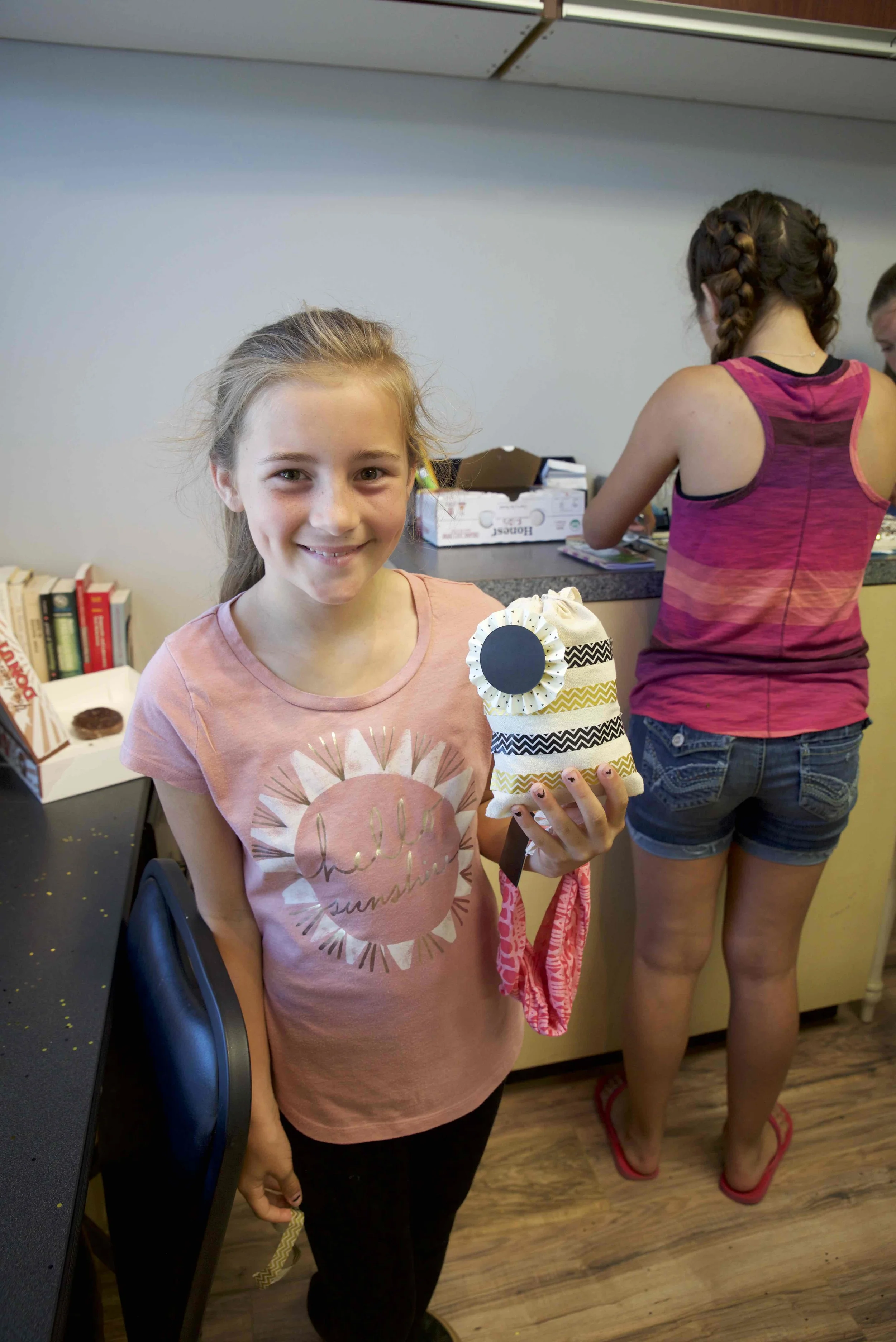 Academy student, Kiah Roufs, proudly displaying her self-decorated “Ready Pack.”