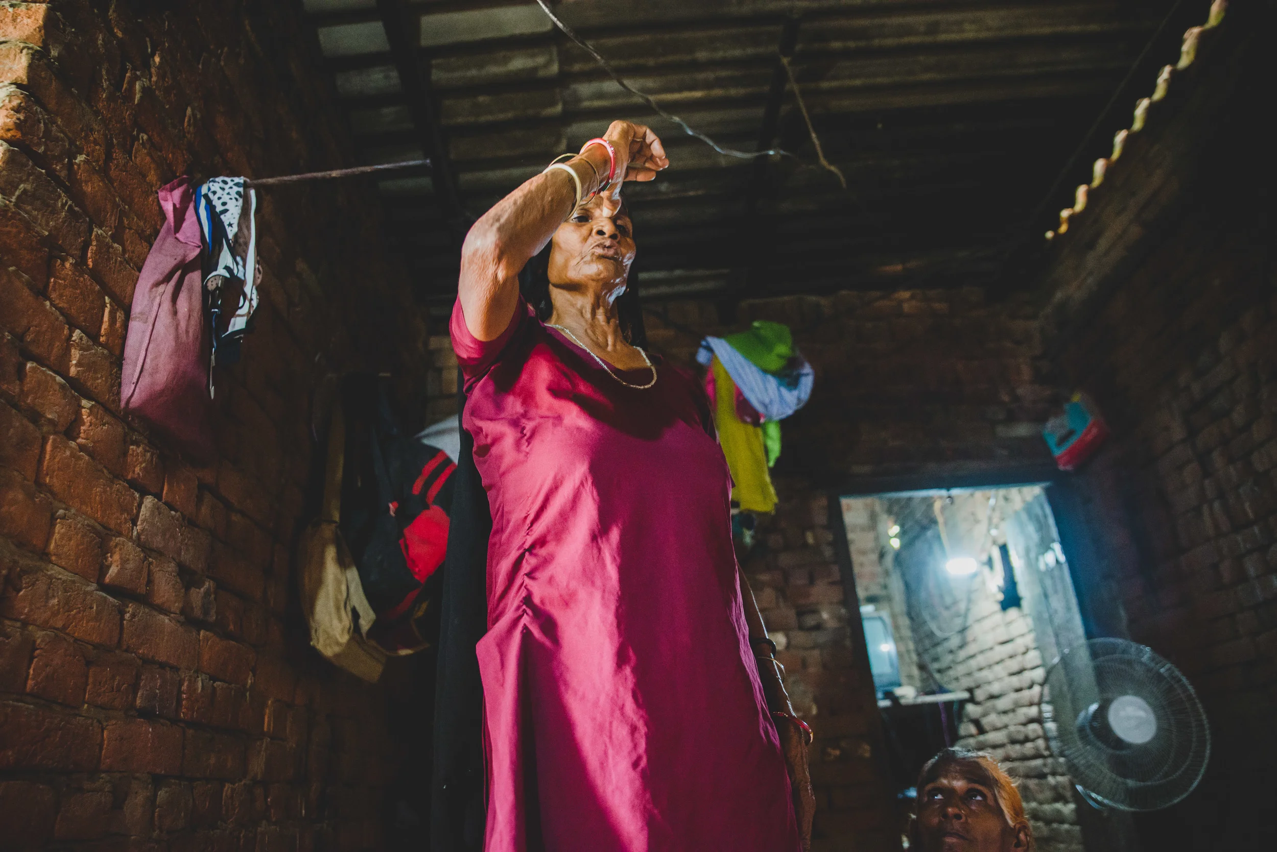 A teacher at heart, Ram Rakhi demonstrates one of the methods she uses to determine the position of the baby. She pours oil on a woman's navel to see the path which it trickles down her stomach. "If the oil falls straight, the baby is straight," she pronounces confidently. 