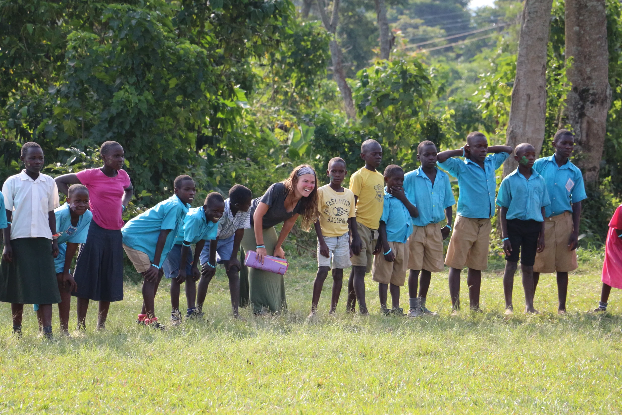 Darbie Guess facilitates a game during Camp Skillz with the children from St. John's Primary School. The camp taught values in teamwork, patience, and endurance. 