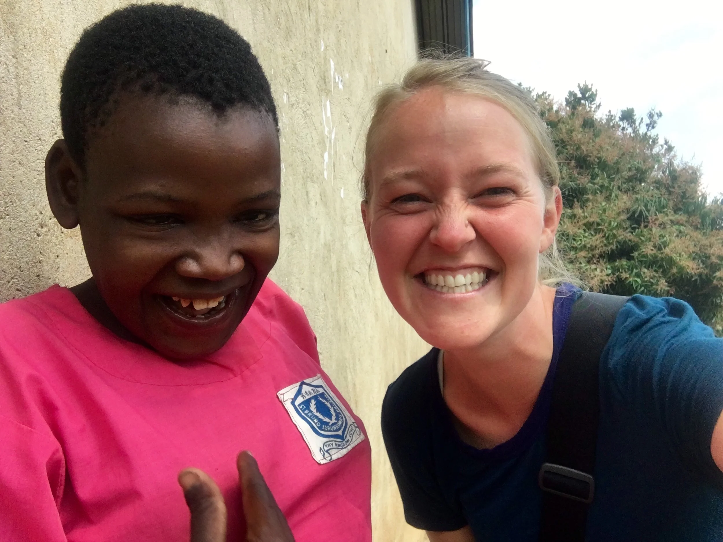 Corey Foster, student at the Institute for G.O.D., and Nalubega Jessica, Uganda