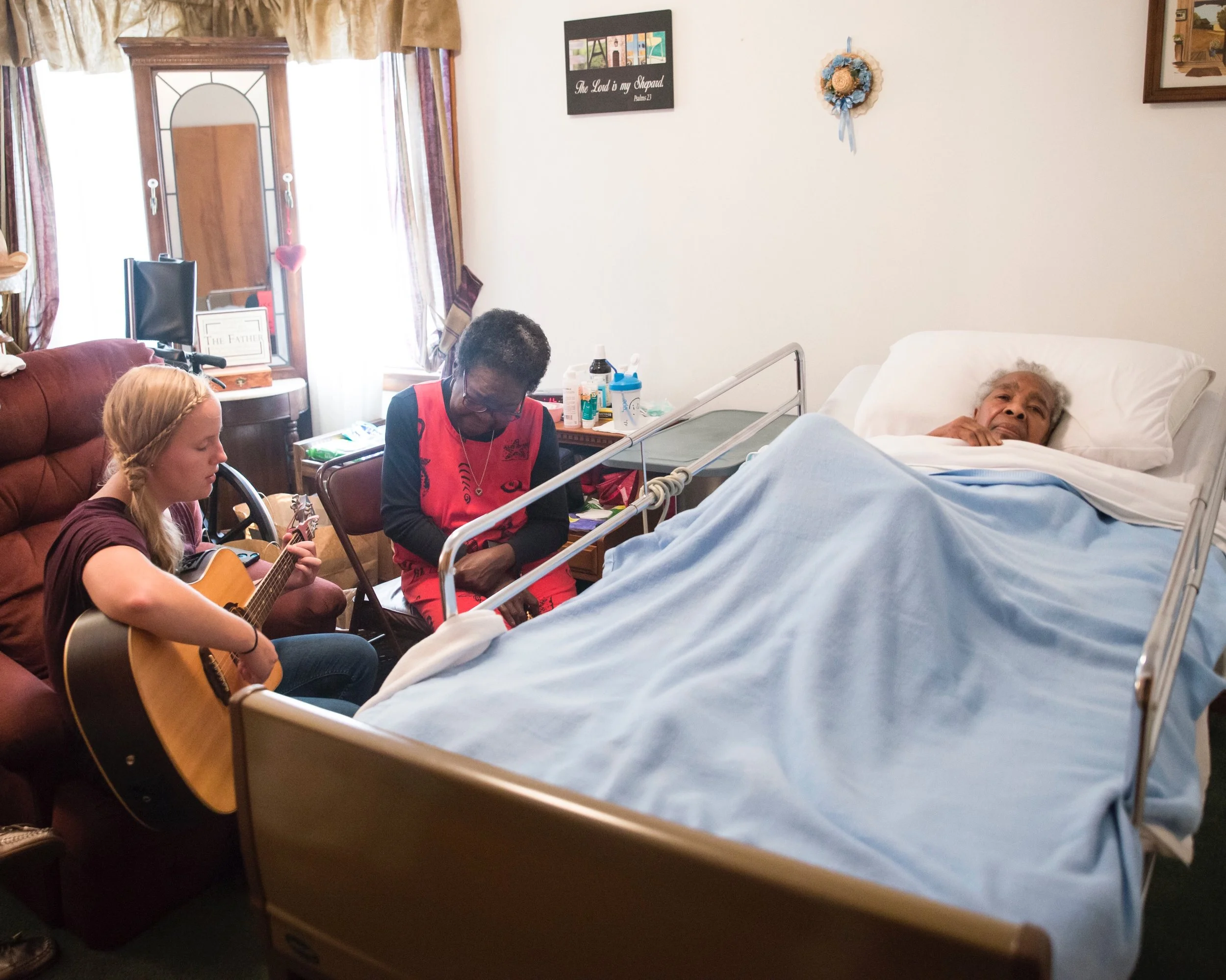 Anna is a student of the Widow and Elderly Care class. Before she took the class she was doing the work of Elderly Care. Week after week, she assisted in the physical care of Mrs. Elizabeth. But it was when she picked up her guitar and softly played hymns that were familiar to Mrs. Elizabeth. that she realized the value of meeting deeper, less evident emotional needs. “She may not talk for days,” said Anna, “but when I begin to play and sing, she moves her lips and, even though it is just in a whisper, she sings the words to the song.”