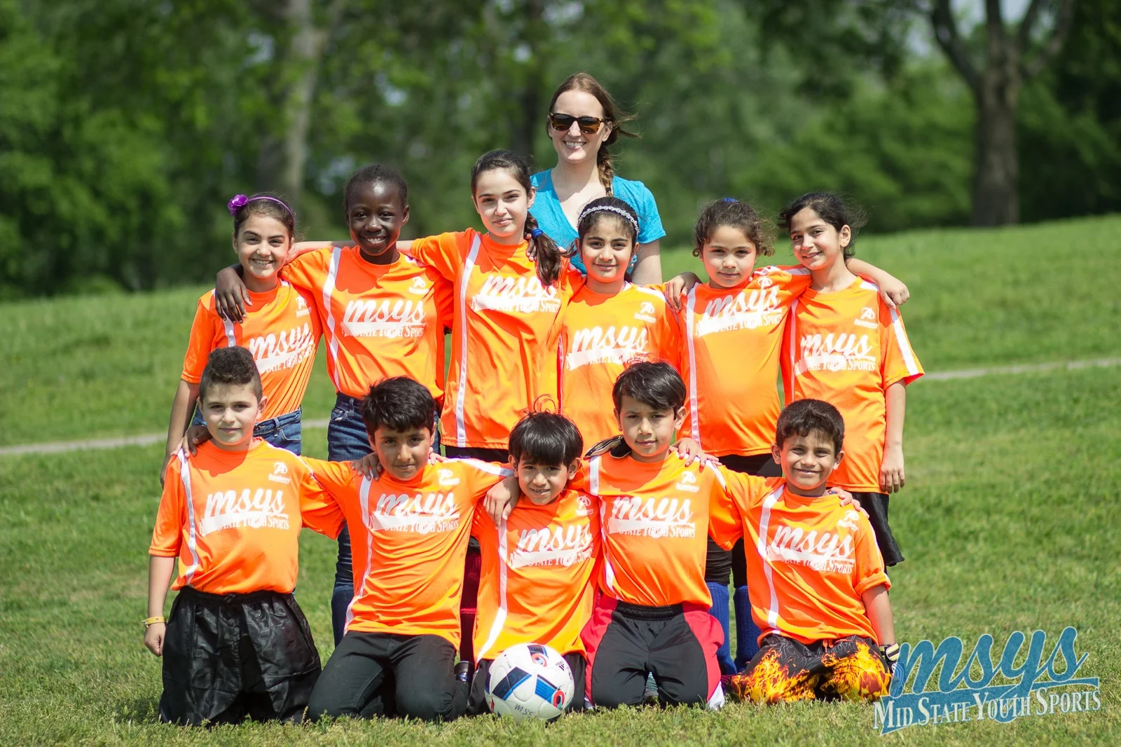 The Nations, 2017. Teams like this are helped by the generosity of corporate sponsors like Scouts Barbershop, Yeast Nashville, The Pharmacy, Mas Tacos, Bongo Java, Fat Bottom Brewery, Smith & Lentz Brewing and Zaxby's. Ben says, “The East Nashville business community has really enjoyed partnering with us to benefit kids in their neighborhood.”