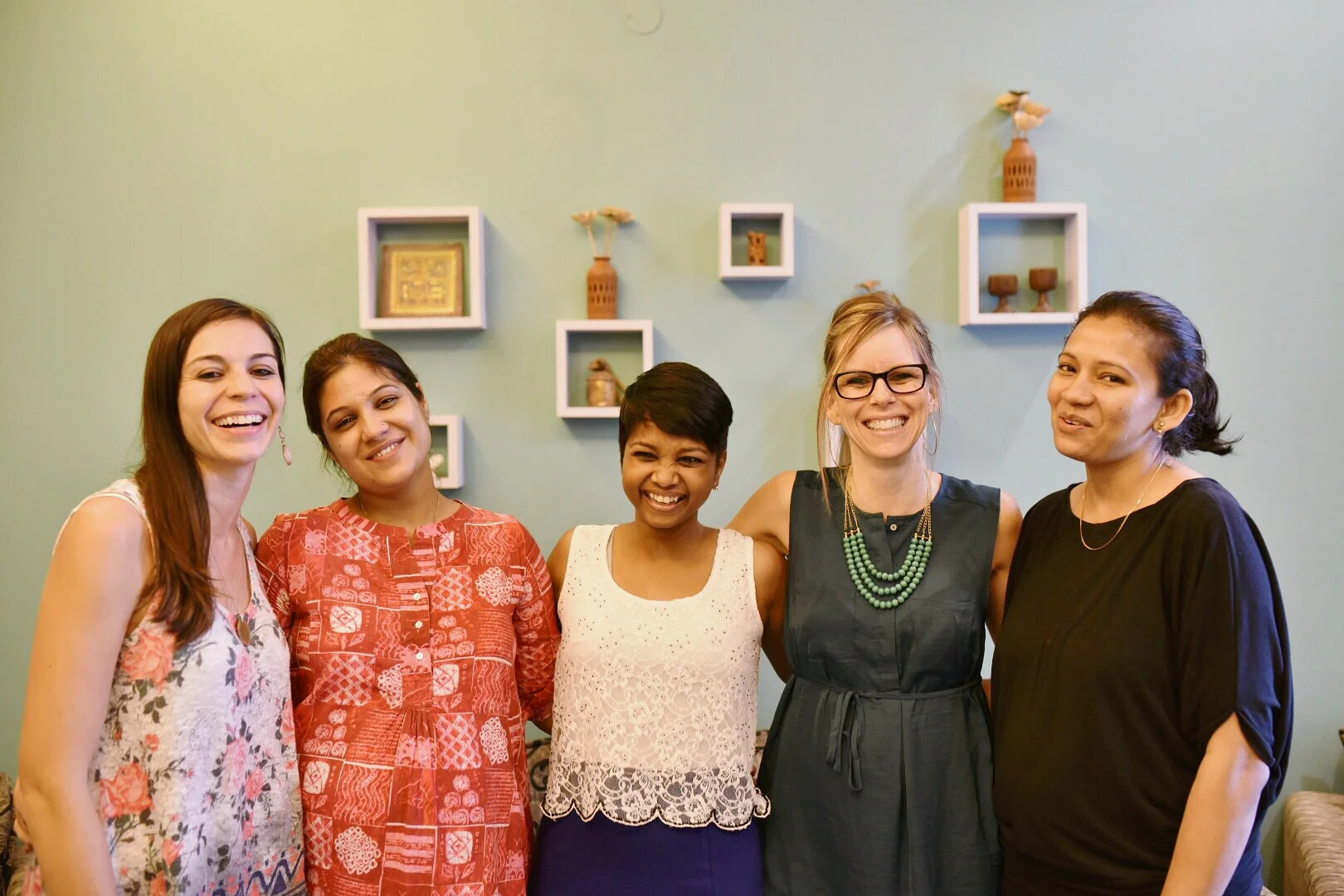 Sneha (center) with G.O.D. birth workers Heather Munoz and Tara Garner in 2016, at her first childbirth education seminar with G.O.D. International. 