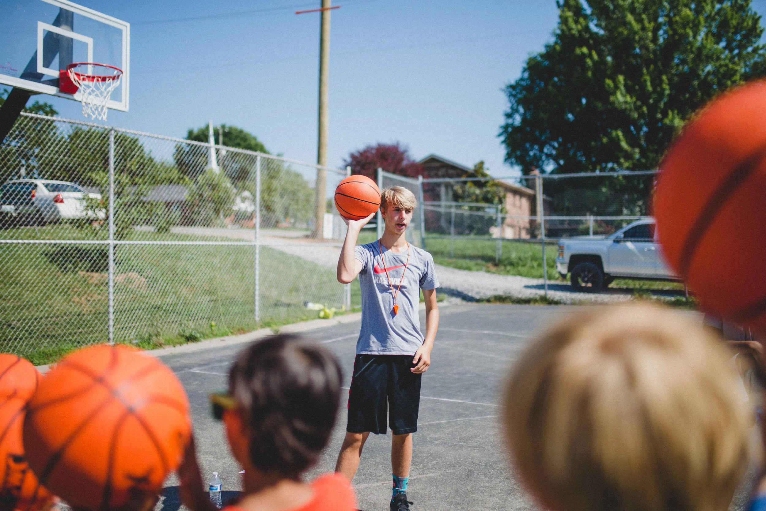Campers at Camp Skillz know this WorkWell employee as "Coach Buckets," and find him entertaining and encouraging, and he's good at basketball. 