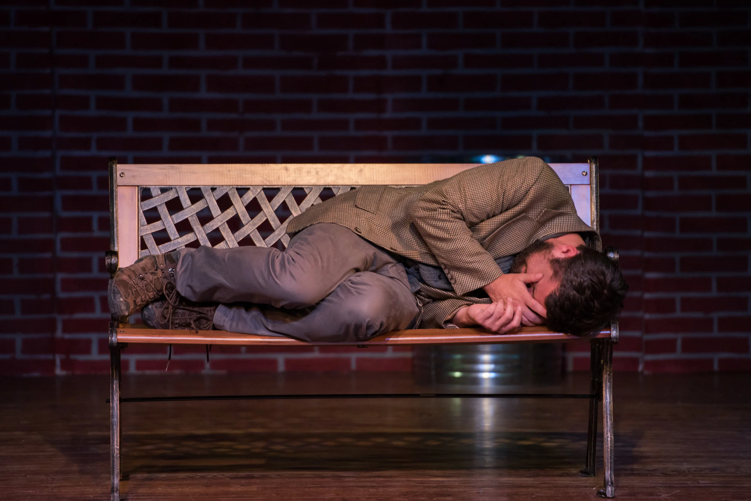 It's a sight we've all seen before. The question is, how did that person get there? It's a question we often assume an answer to. But perhaps we aren't all that different than the person lying on the bench. 