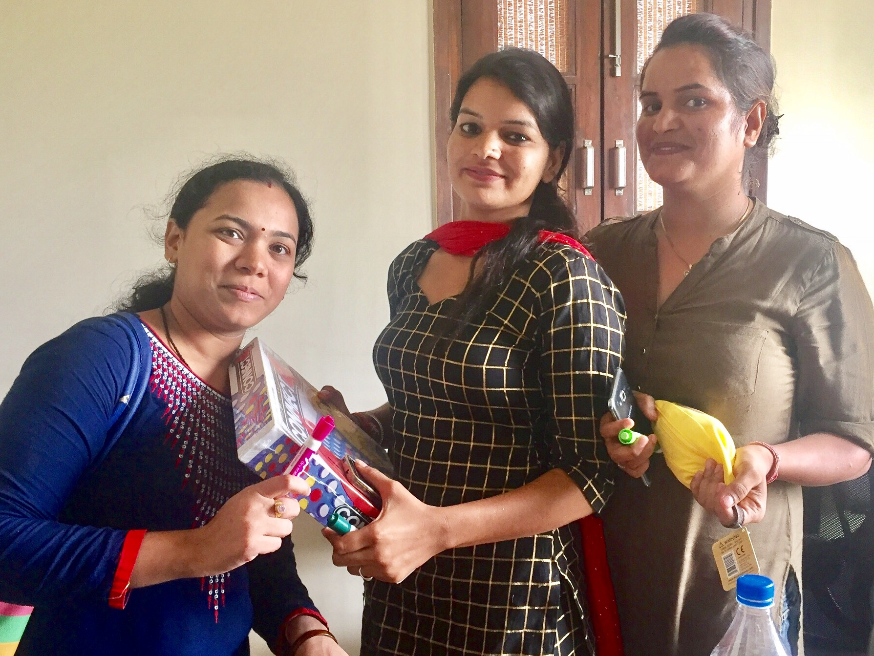 In an exercise to teach how positive reinforcement and group rewards can promote good behavior in students, these teachers won prizes of their own that they can use in the classroom. 