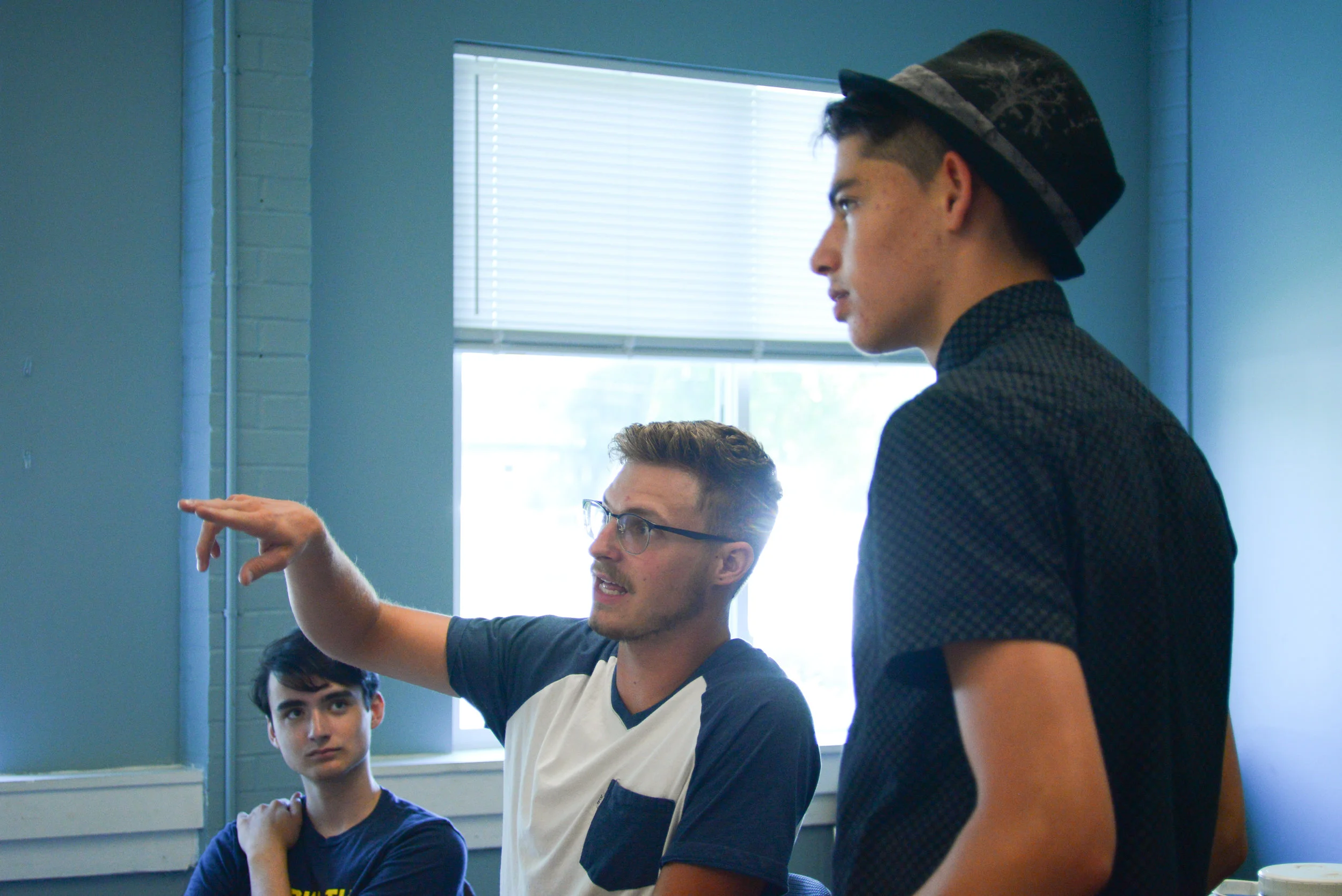 Austin Milliron helps his team foresee issues as they are planning for the basketball clinic that will begin next week! Austin is a student at the Institute for G.O.D. and this is his second year with WorkWell. 