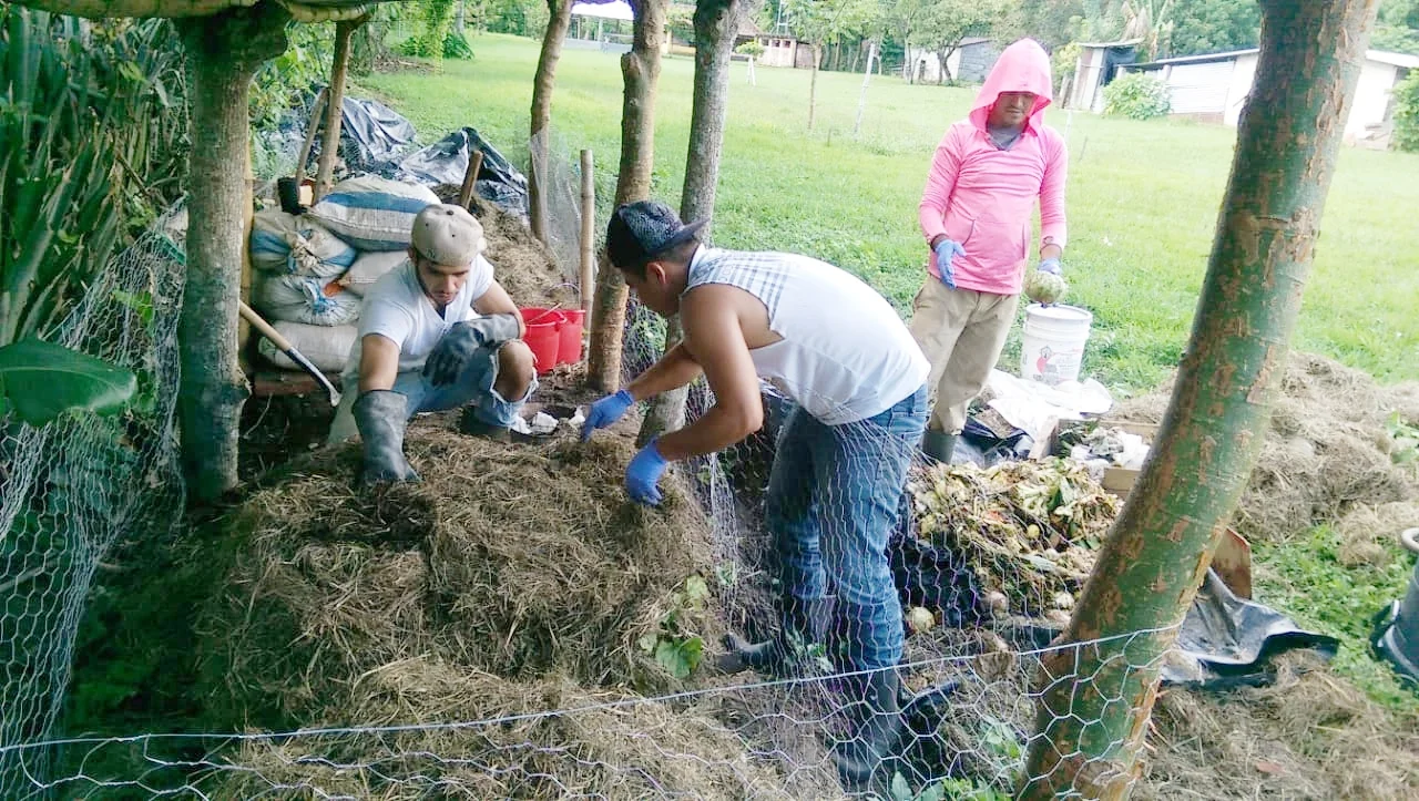 Interns Miguel, Willian and Amilcar work to “cook” compost to improve the soil of the garden. Composting was not a familiar concept to Antonio at first, but now that the beds have had time to “cook” and he’s used the soil to grow food in abundance, he’s a firm believer!