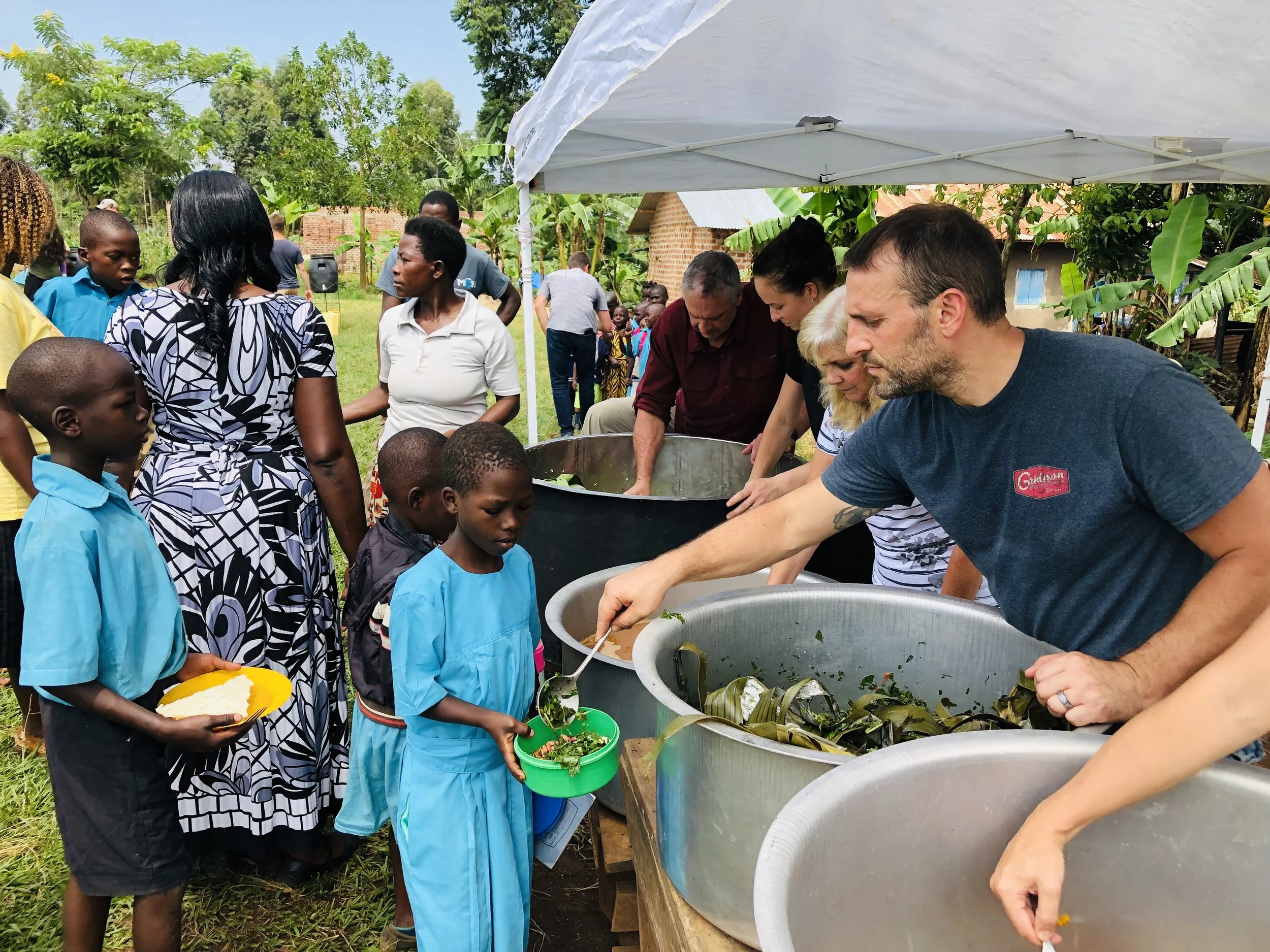 While G.O.D. has employed farmers to grow food and given assistance to the school cook, preparing and serving the food still depends on volunteers. Last week participants in the Family and Friends trip were able to harvest, prepare and serve lunch.