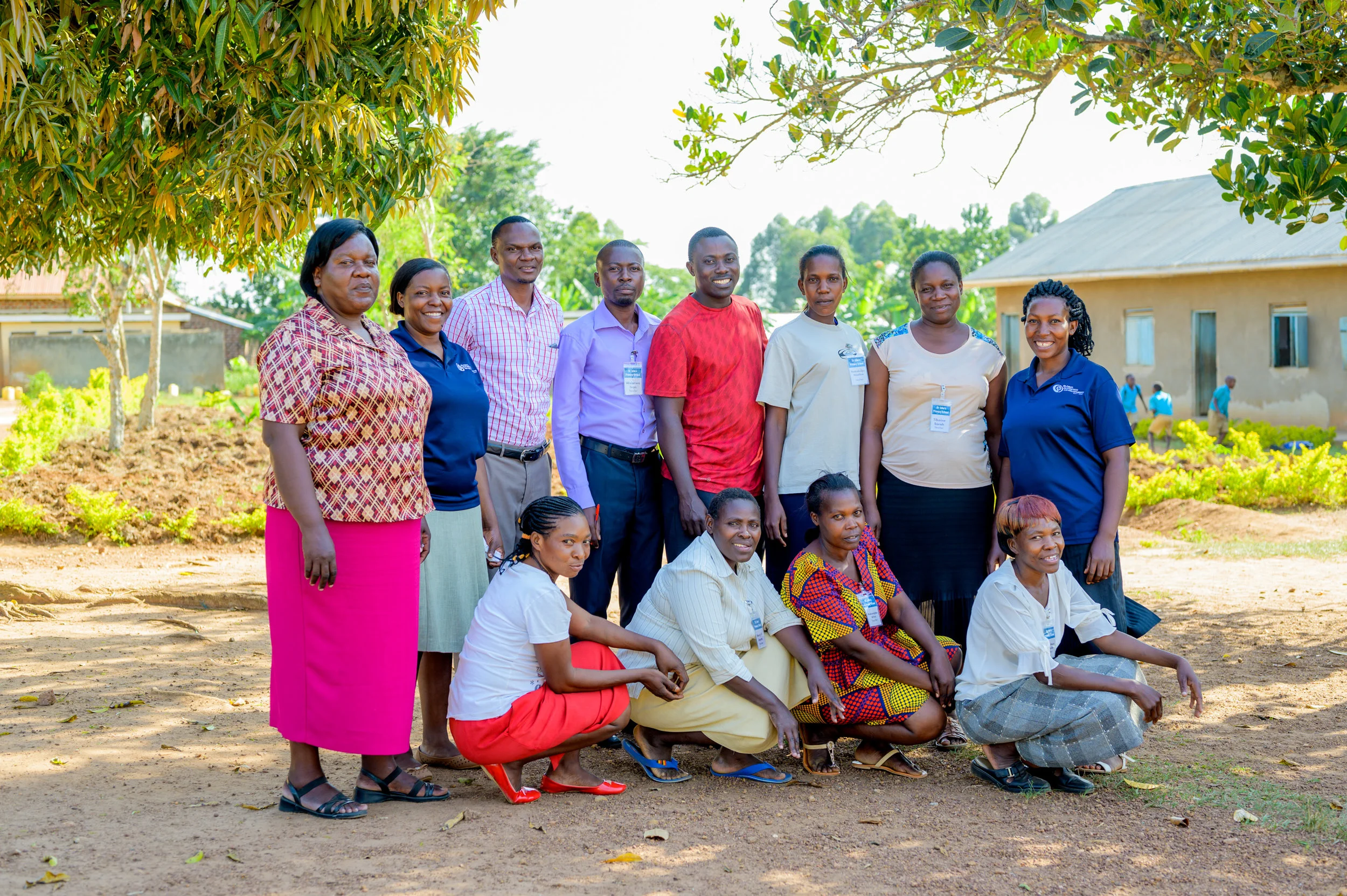 Teachers at St. John’s school in March of 2019. Lawrence Ssemakula, G.O.D. Director of Education in East Africa, is in red at the center. His wife Josephine is standing second from left.