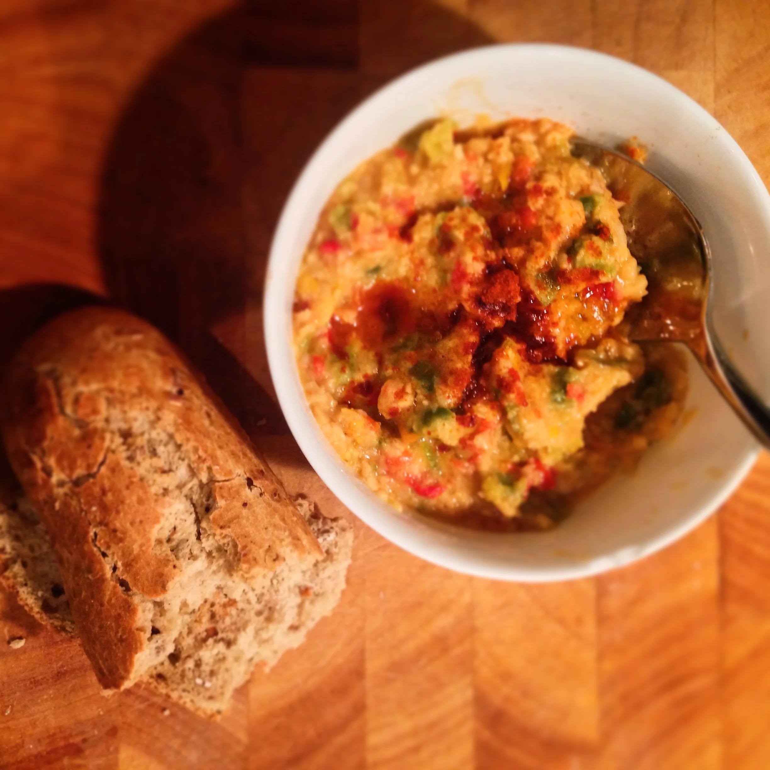 Fantastic home-made roasted pepper and chickpea chunky hummus, olive and paprika with warm malted granary, under 36p/portion.