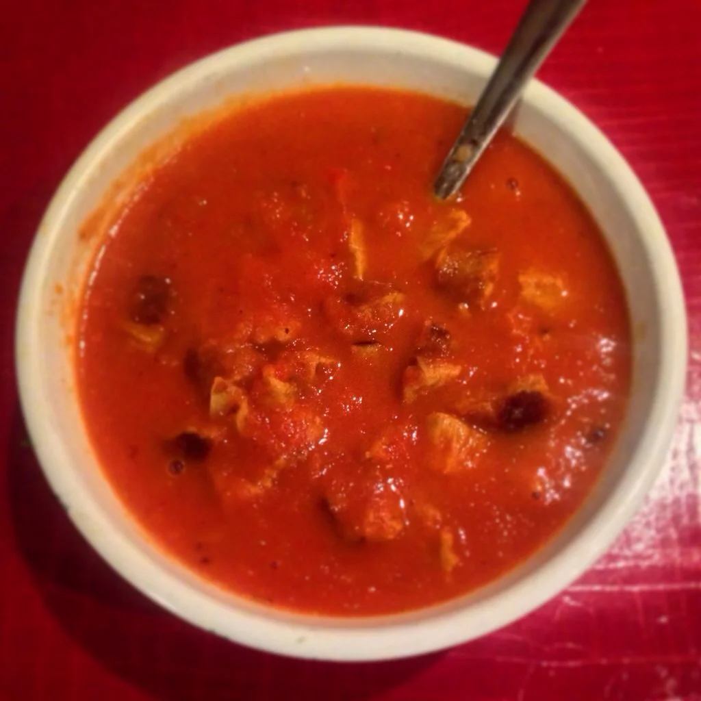 Warming bowl of creamy tomato and pepper soup with cooked sausage stirred through. About 47p.