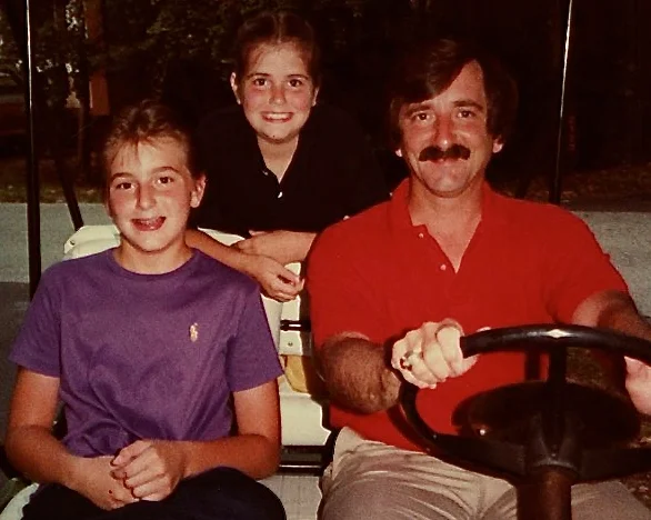 Me, Robin, Dad on a Fort Wilderness golf cart.