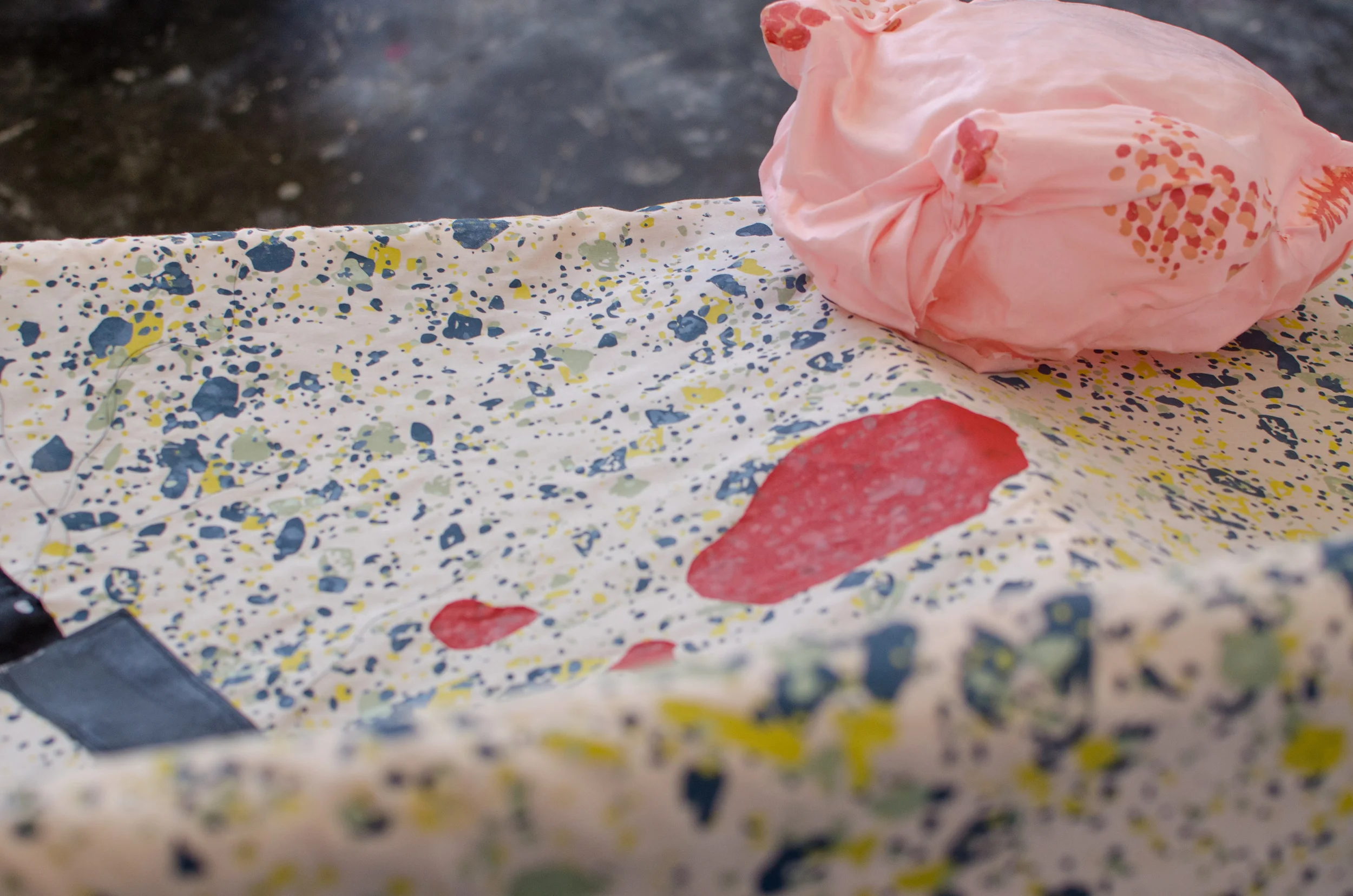 “(S)laughter” (detail), 2016, Screen-printed fabric, thread, plastic wrap, pvc pipe, monofilament