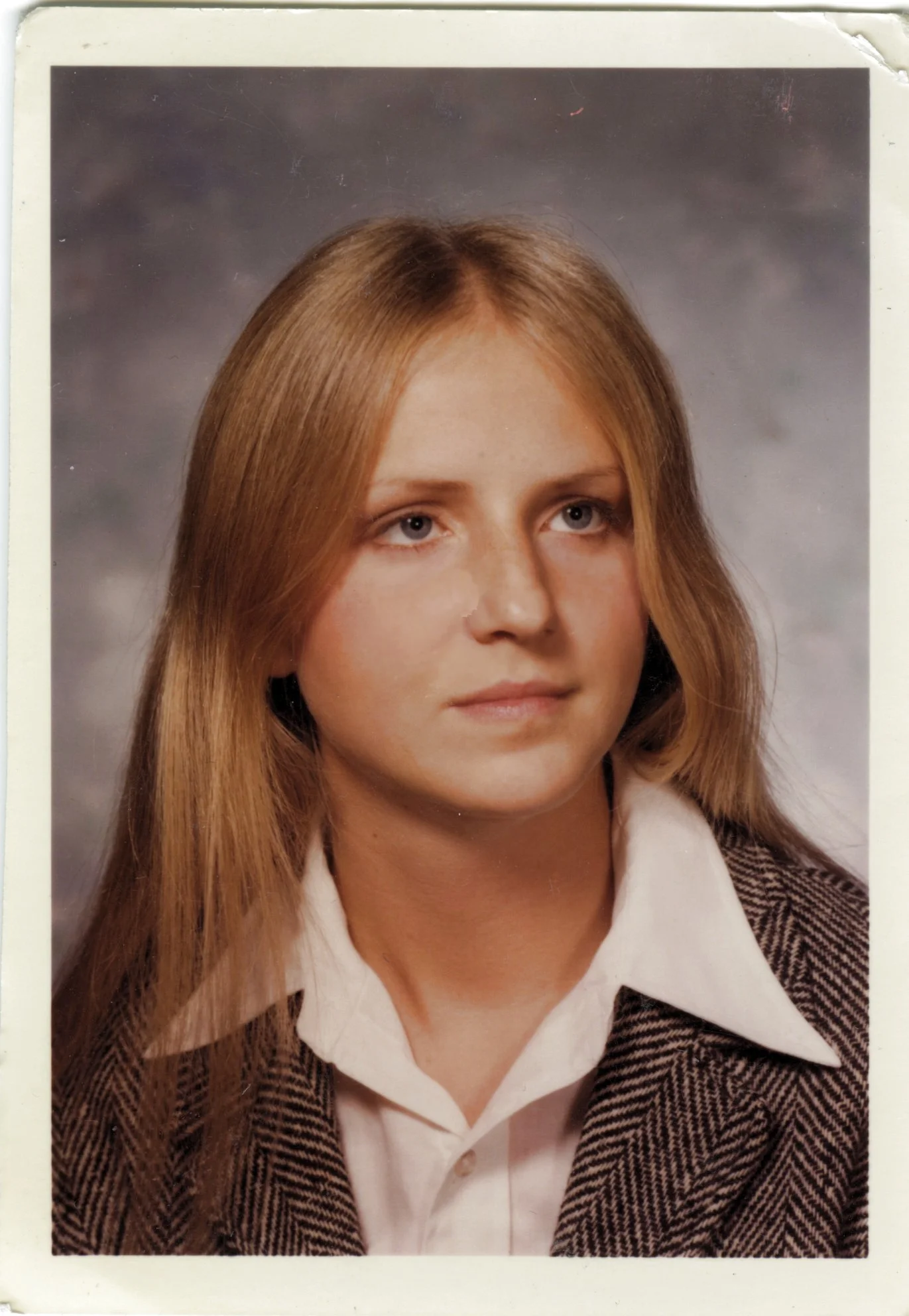 Alouette's high-school graduation photo, front...