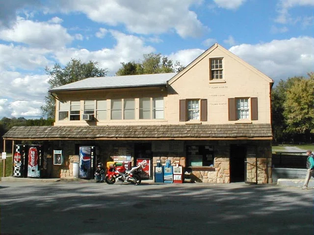 The Whites Ferry store, showing the now-removed payphone on the wall between the Coke and Pepsi machines; from http://www.onthecanal.4t.com/photo.html
