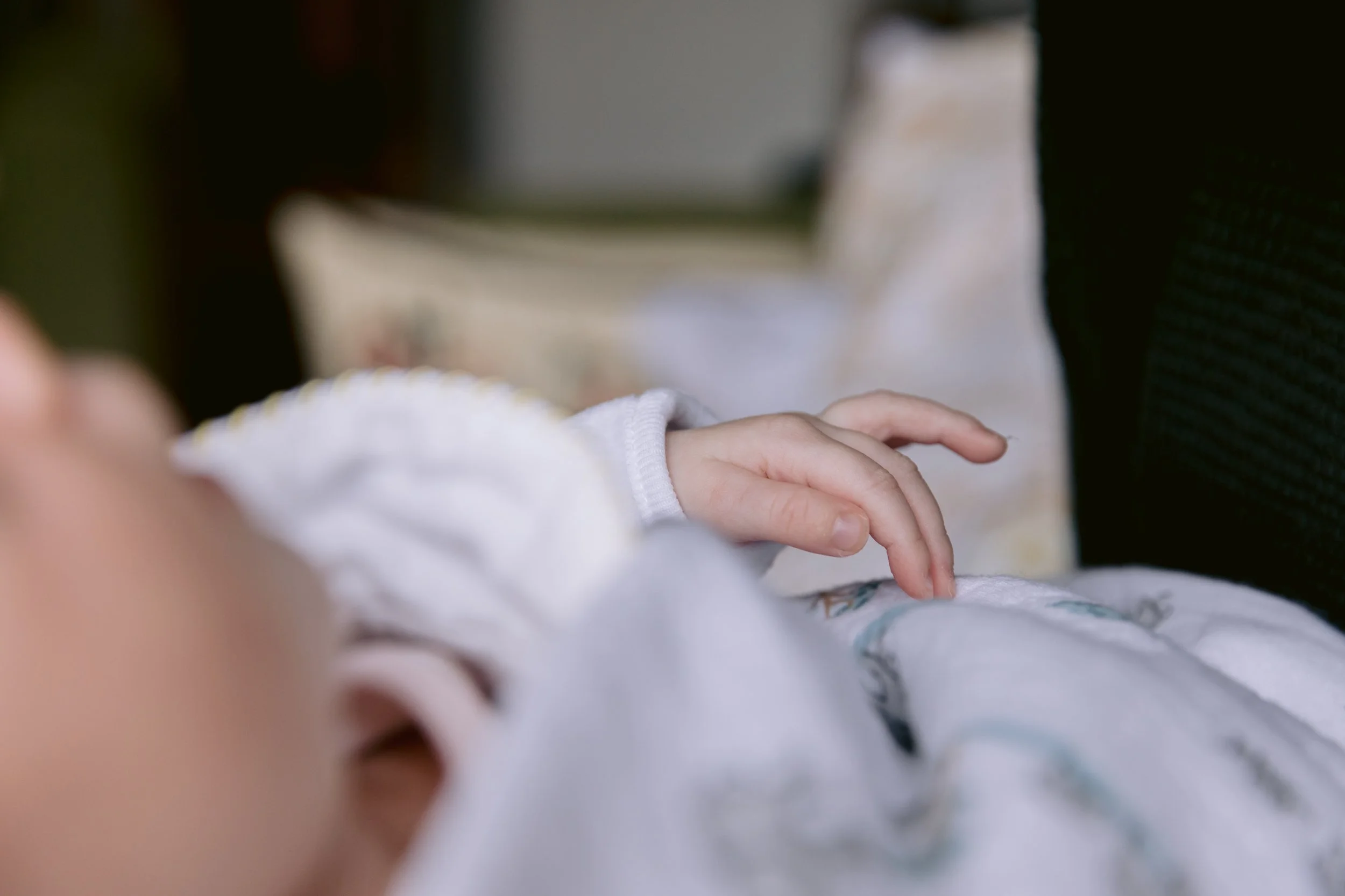 Detail shot of baby's hand during a photo session in Putney, South West London