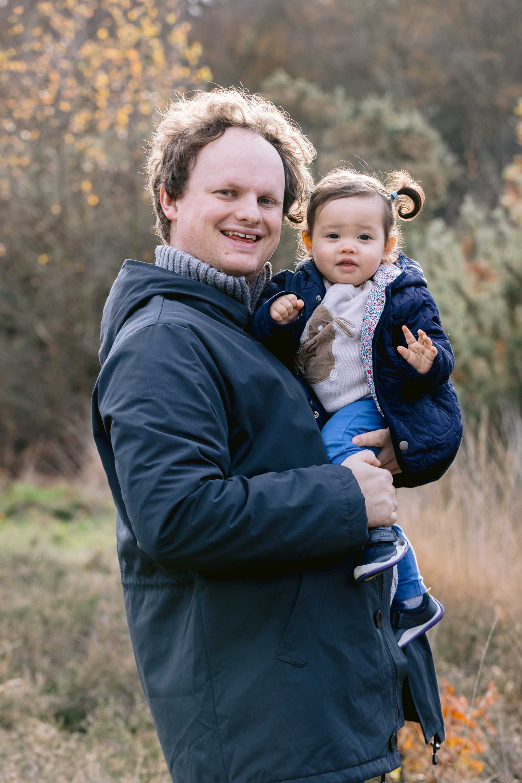 Family photographed using natural winter light outdoors