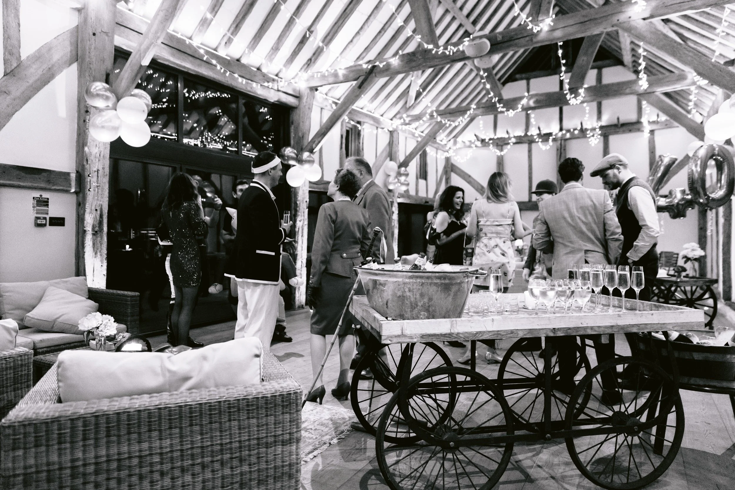 People chatting at a party at Somersbury Barn in Surrey
