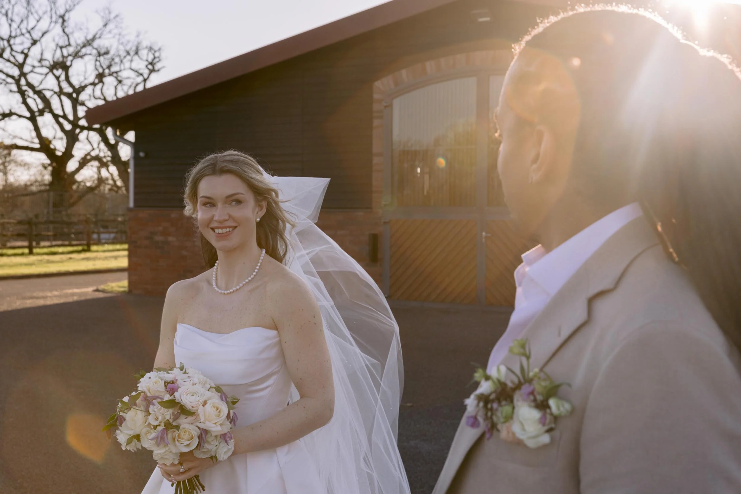 Romantic, sun-kissed portraits of a wedding couple in the Surrey countryside near Dunsfold during their golden hour session.