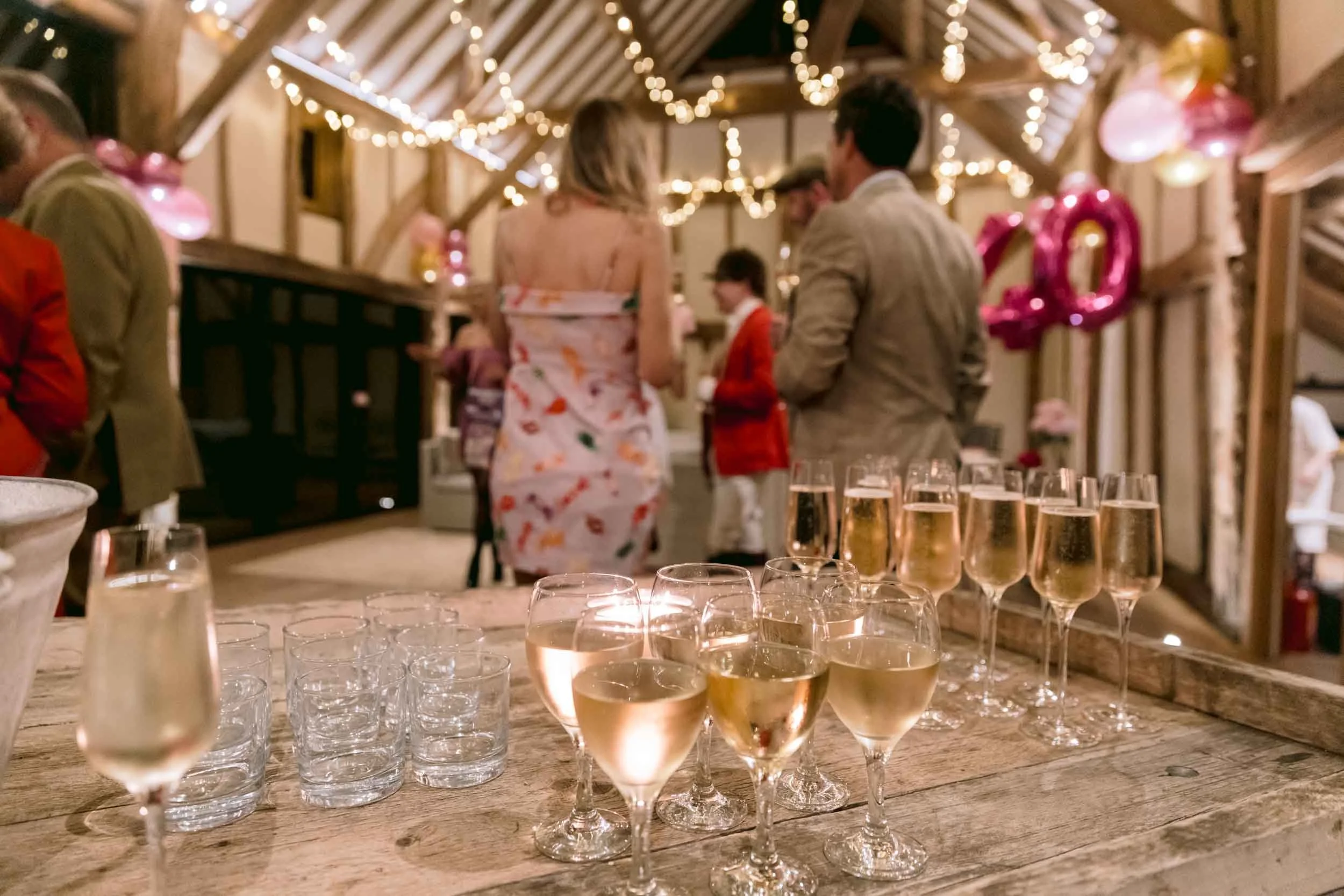 Wedding and event photographer capturing candid shots at a birthday party at Somersbury House in Surrey