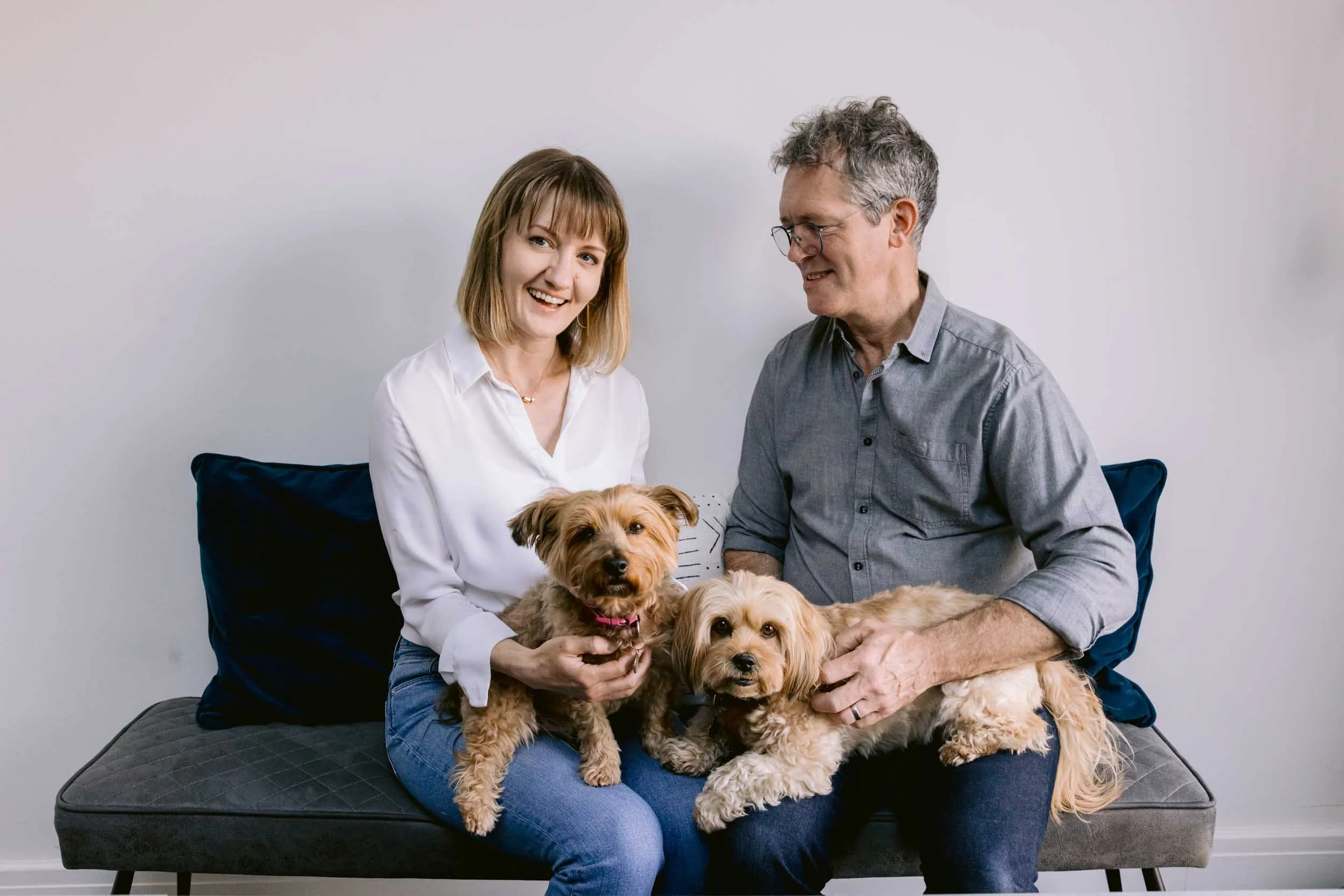 Family portrait during an end-of-life pet photography session in South London, capturing the bond between a beloved dog and her owners.