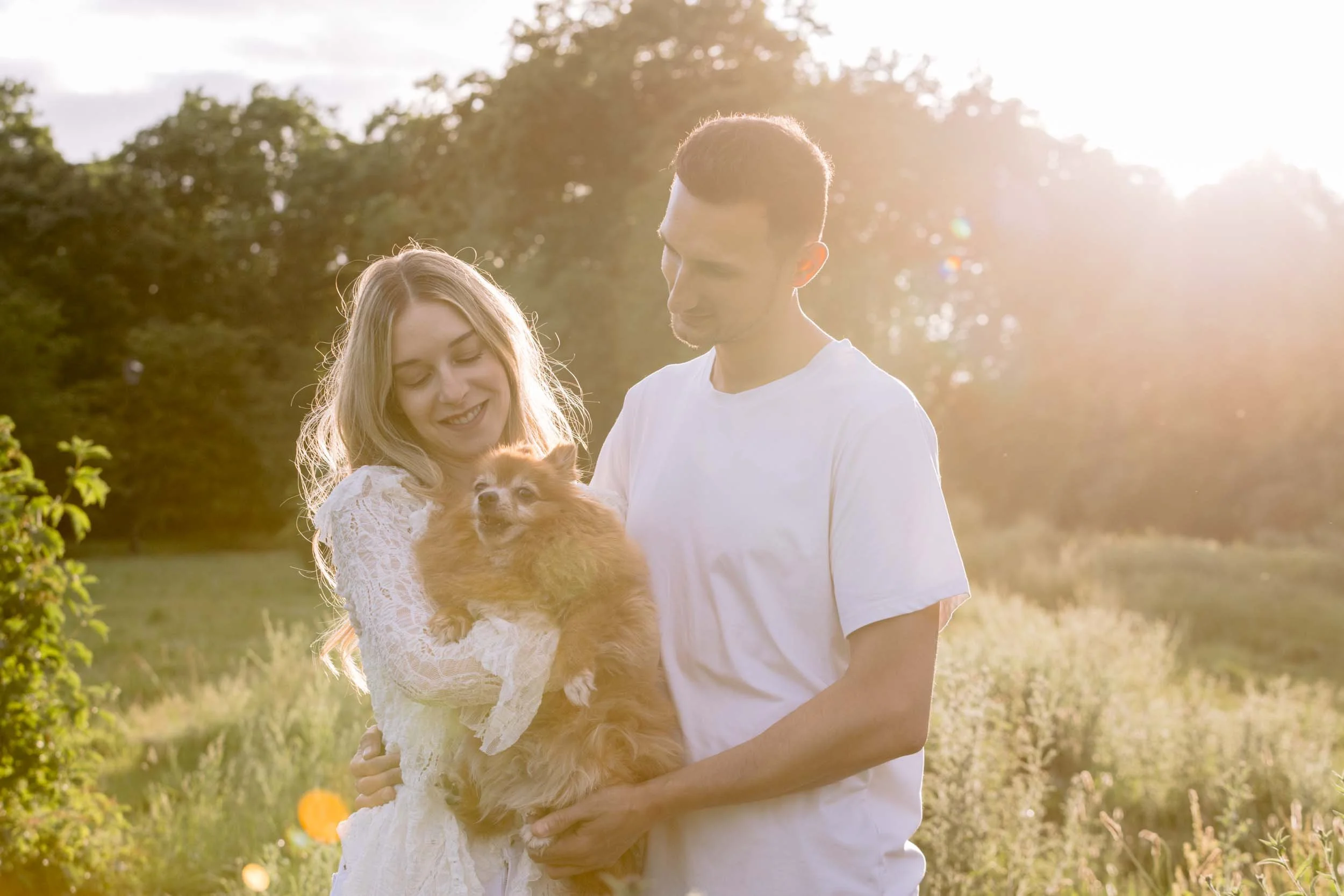 Couple and their dog during golden hour  on Clapham Common
