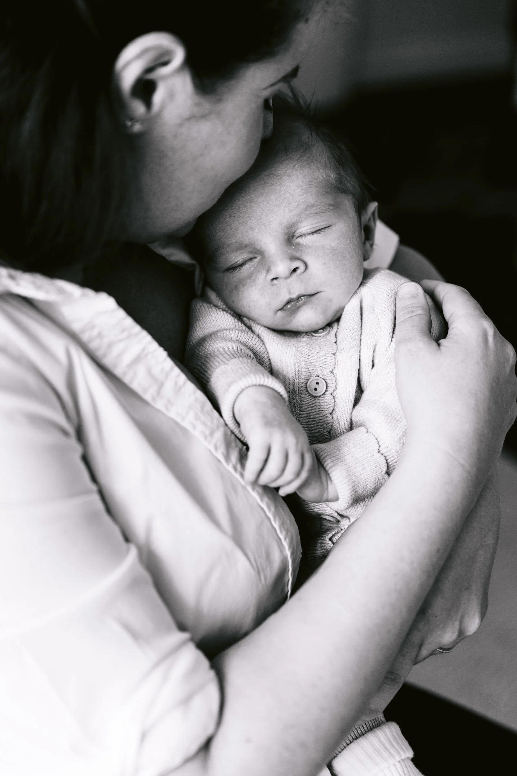 A candid family photography session at home including a newborn