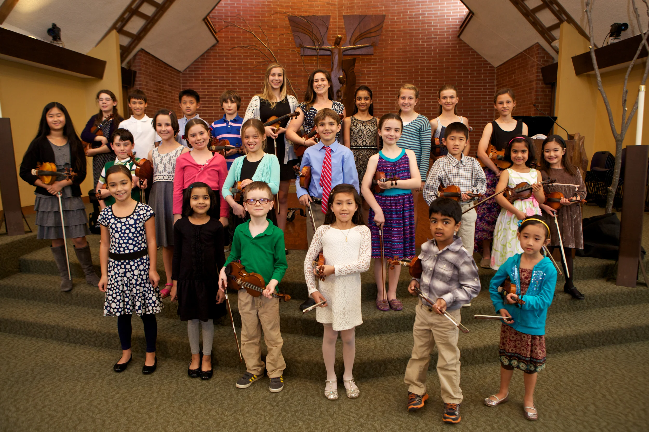 Proud musicians at our Spring Recital in 2015.