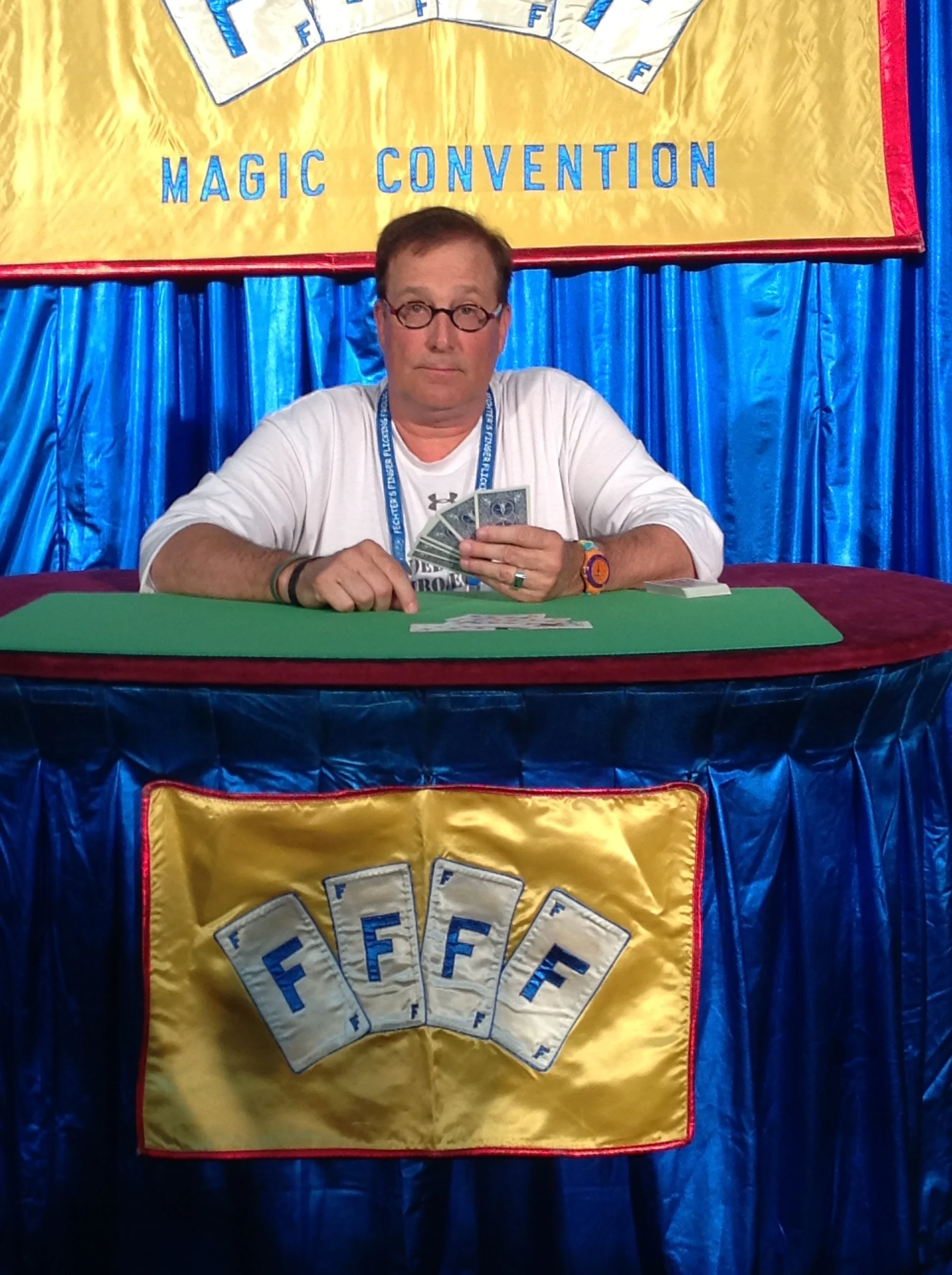 Guest of Honor, Stephen Bargatze, is a frequent foil who is often asked to assist with many of the performers. Here he is assisting Harvey Berg (unseen in this photo) with an original card trick.