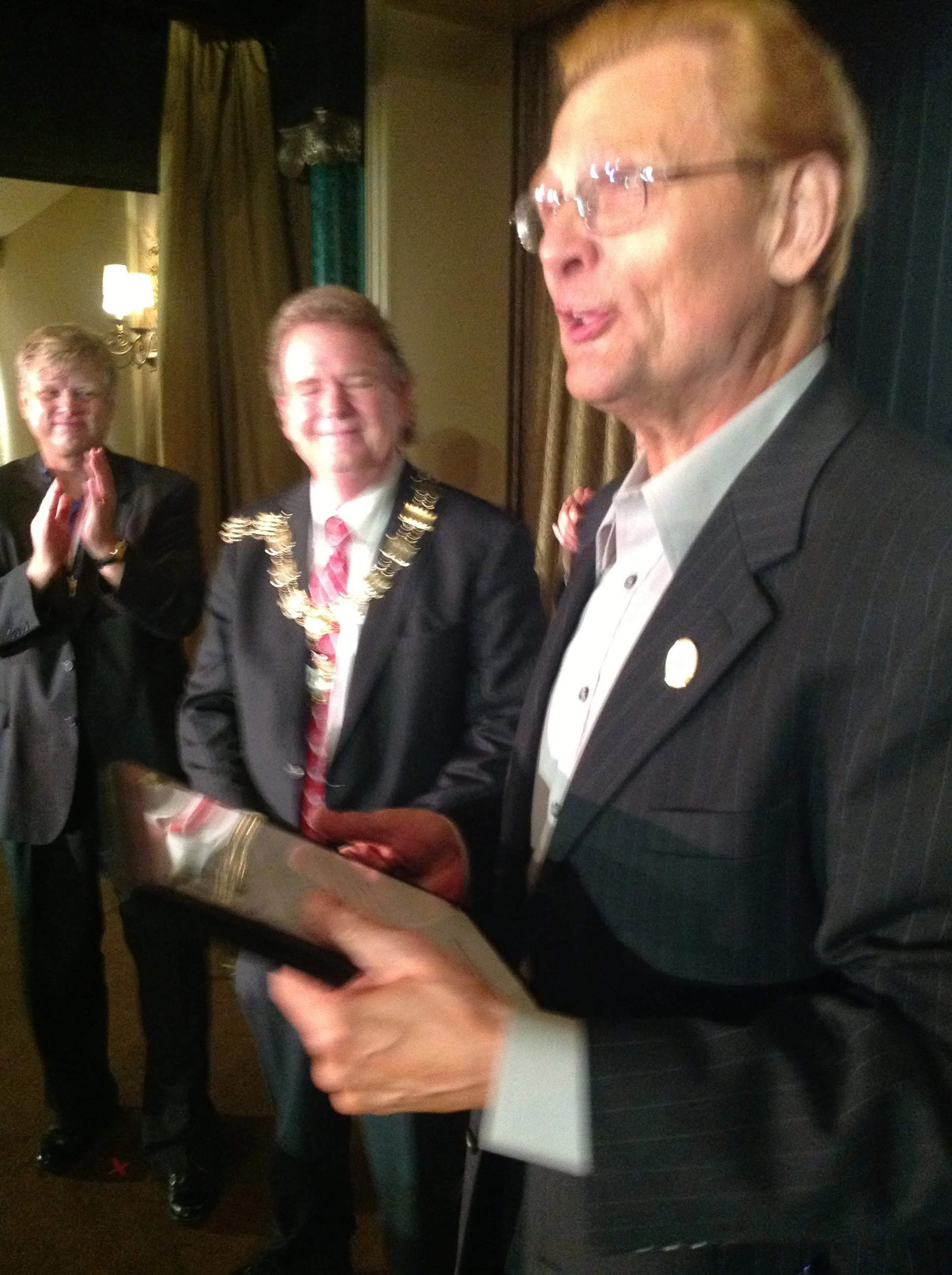 I.B.M. International President Bill Evans presented a certificate to Tom Mullica