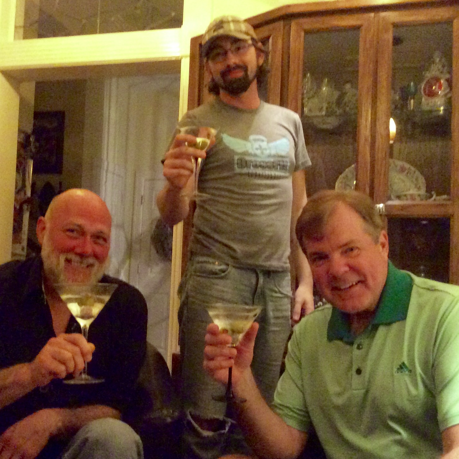 Steve Trash, Robert Livingston and Scott Wells enjoying martinis and magic conversation.
