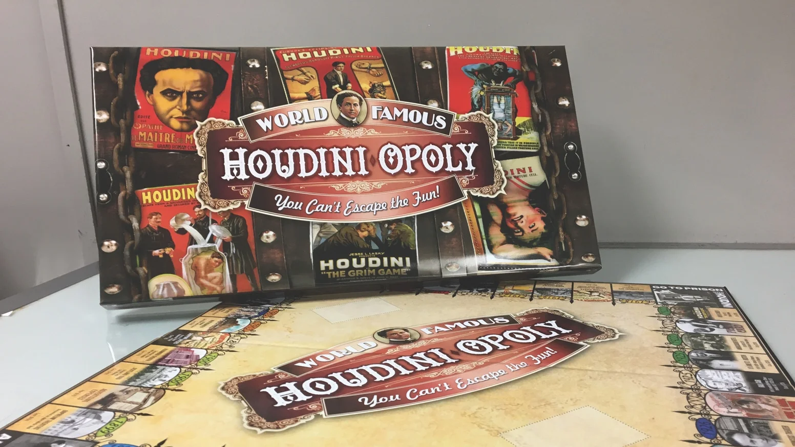 Escape from the ordinary board game. Now available after long last. Click on the graphic above to visit the Houdini-Opoly website to order your new, fun and exciting board game. You can learn more about it in our podcast #341 from January 26, 2017 .