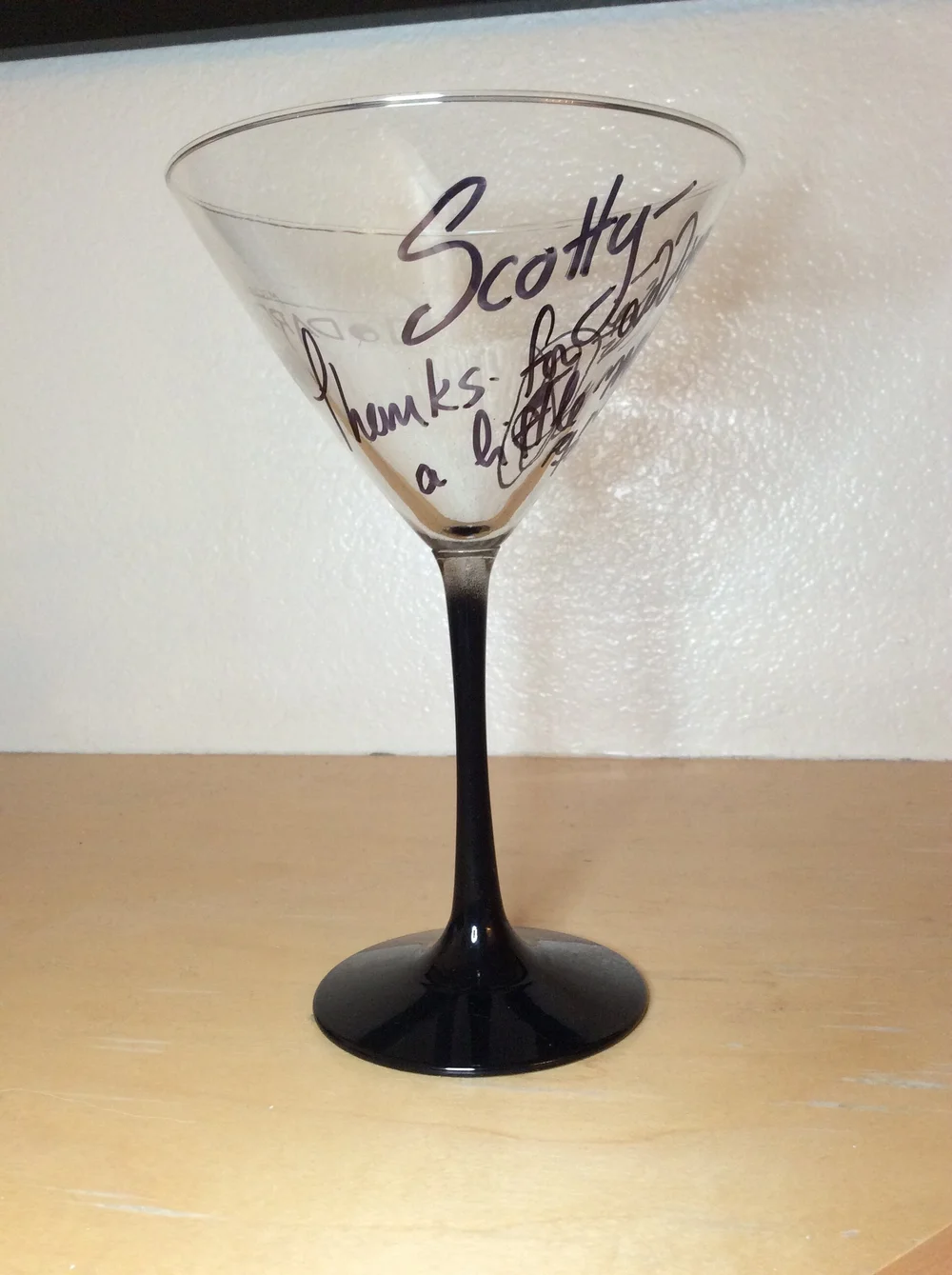 A gift of a signed martini glass from Godard