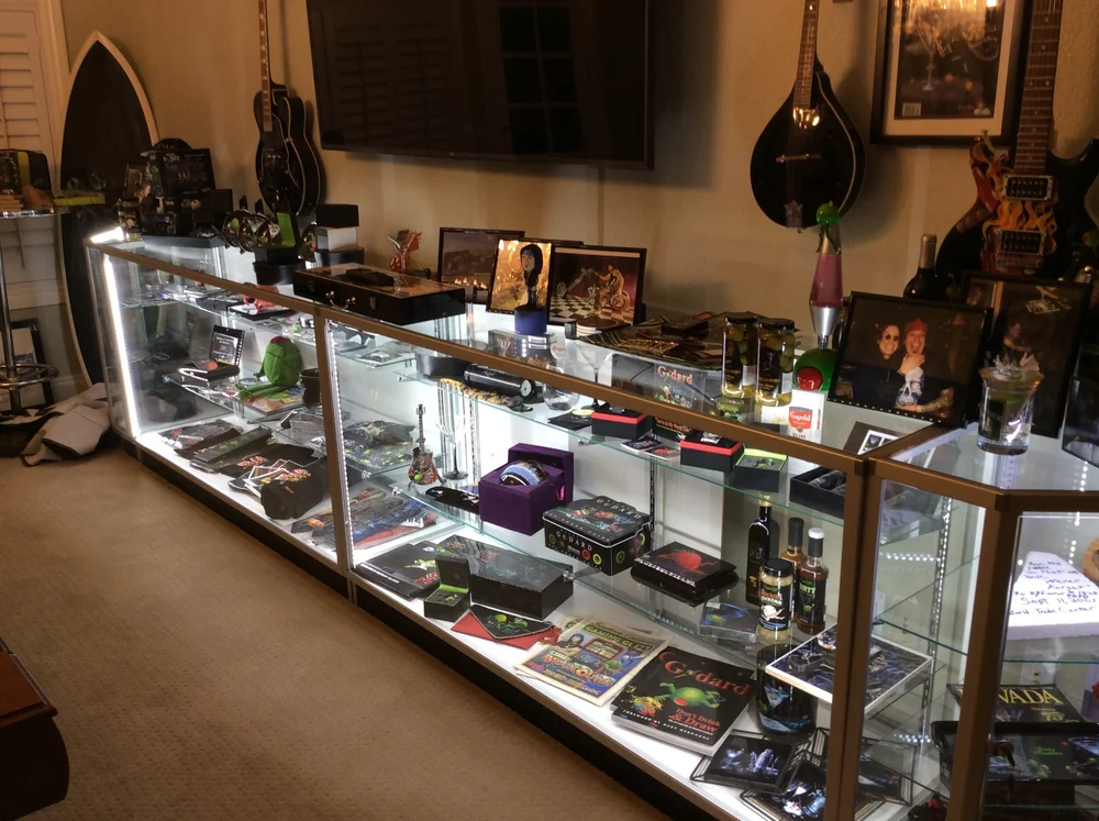 Display cabinet in Godard's home with branded stuff