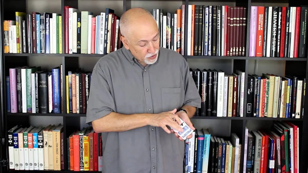 Michael in front bookcase.jpg