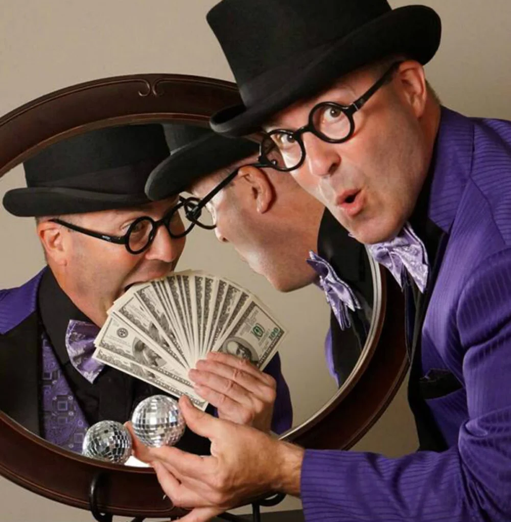 Stu with money.jpg