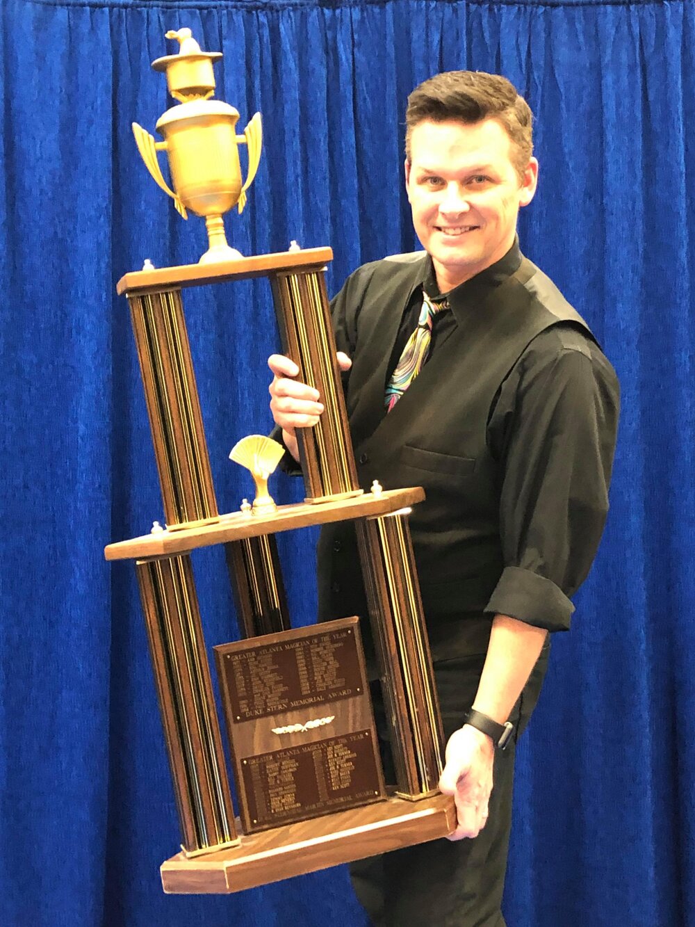 Ken with trophy.jpg